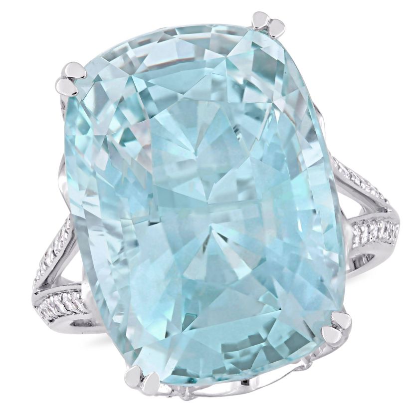 23 ct. t.g.w. Sky Blue Topaz and 5/8 ct. t.w. Diamond Split Shank Cocktail Ring in 14K White Gold