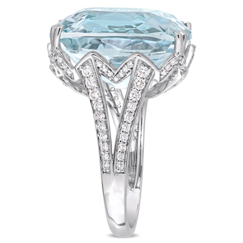23 ct. t.g.w. Sky Blue Topaz and 5/8 ct. t.w. Diamond Split Shank Cocktail Ring in 14K White Gold