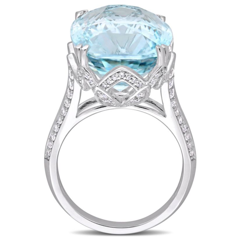23 ct. t.g.w. Sky Blue Topaz and 5/8 ct. t.w. Diamond Split Shank Cocktail Ring in 14K White Gold