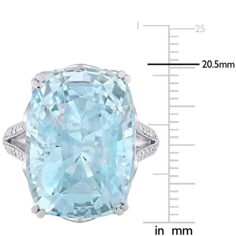 23 ct. t.g.w. Sky Blue Topaz and 5/8 ct. t.w. Diamond Split Shank Cocktail Ring in 14K White Gold