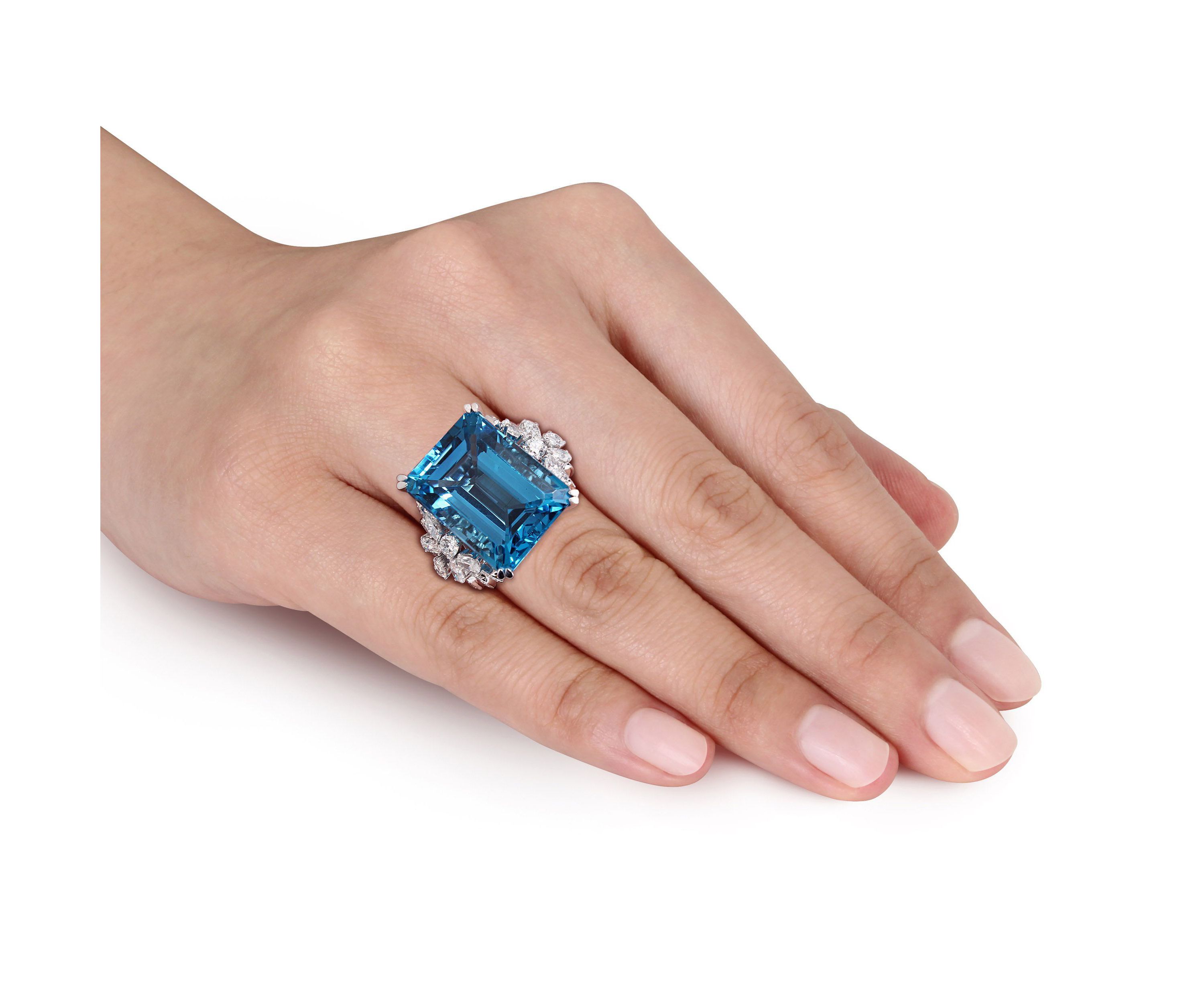 31 ct. t.g.w. Swiss Blue Topaz and 1.75 ct. t.w. Diamond Cocktail Ring in 14K White Gold