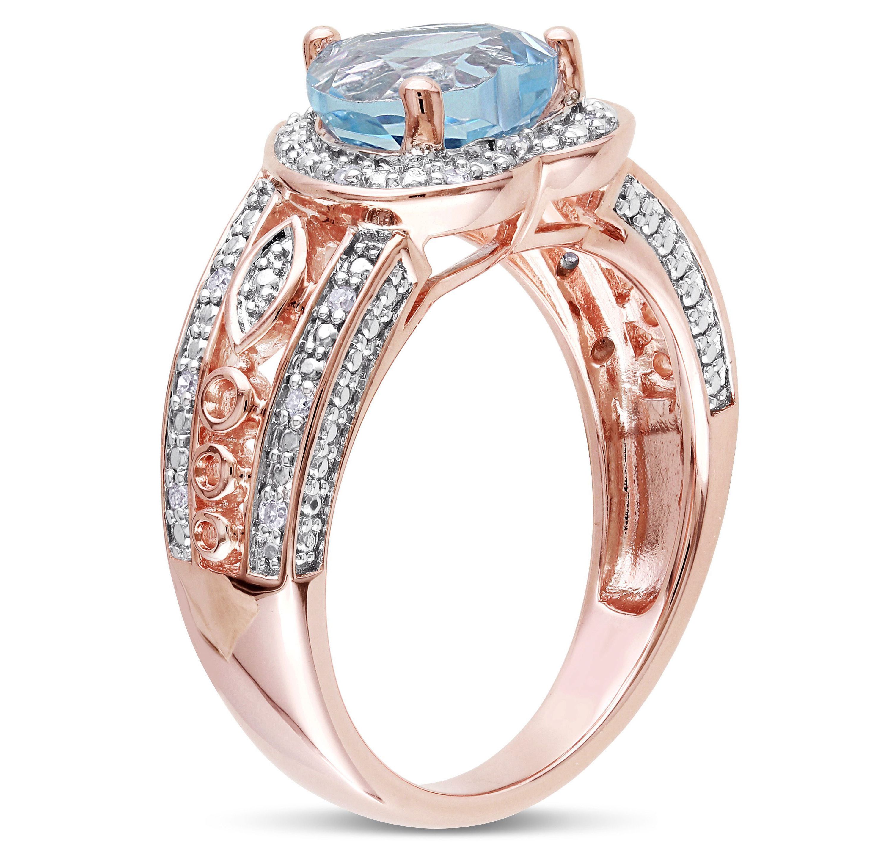 2 ct. t.g.w. Sky Blue Topaz and 1/10 ct. t.w. Diamond Heart Ring in Rose Plated Sterling Silver