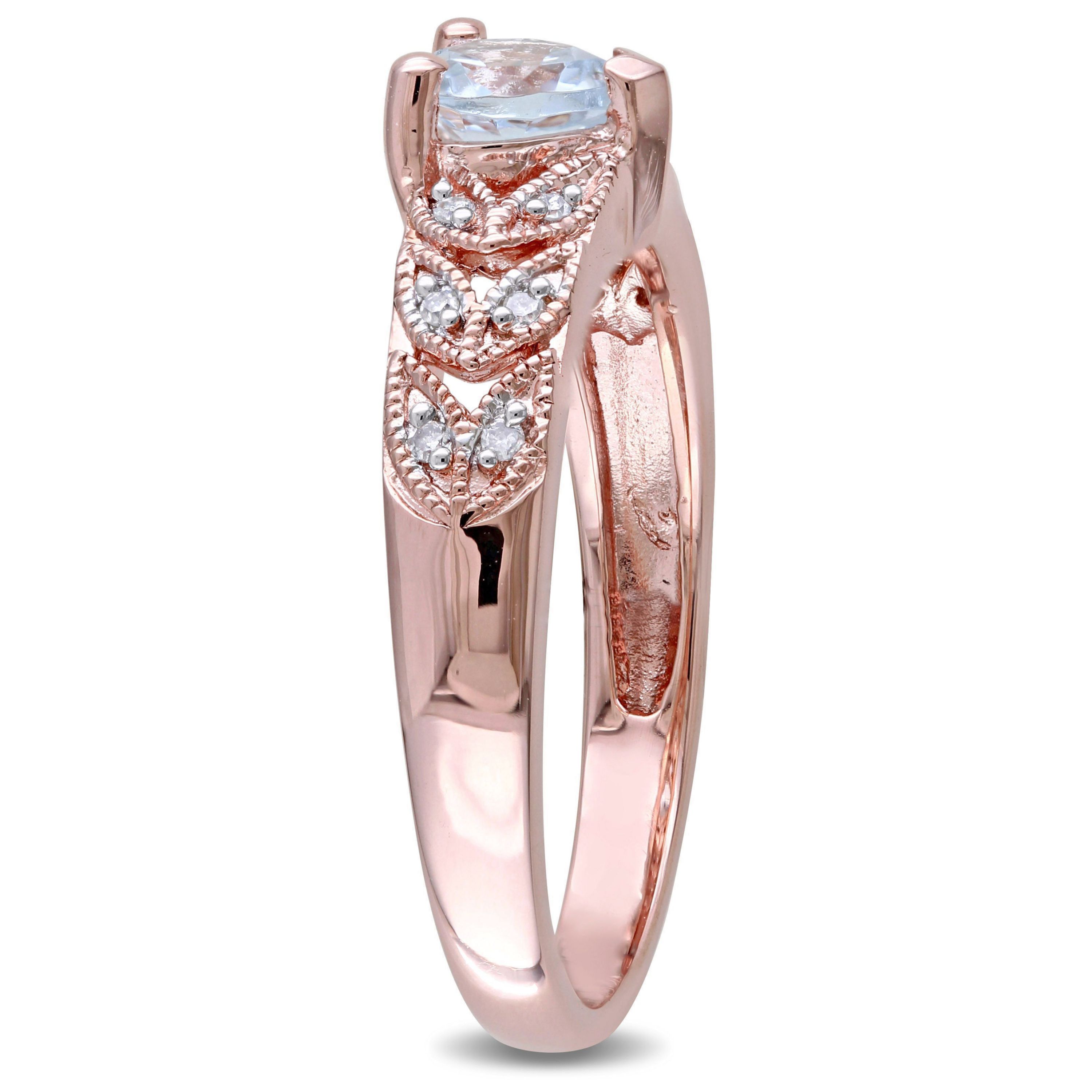 1/3 ct. t.g.w. Aquamarine and 1/10 ct. t.w. Diamond Heart Ring in Rose Plated Sterling Silver