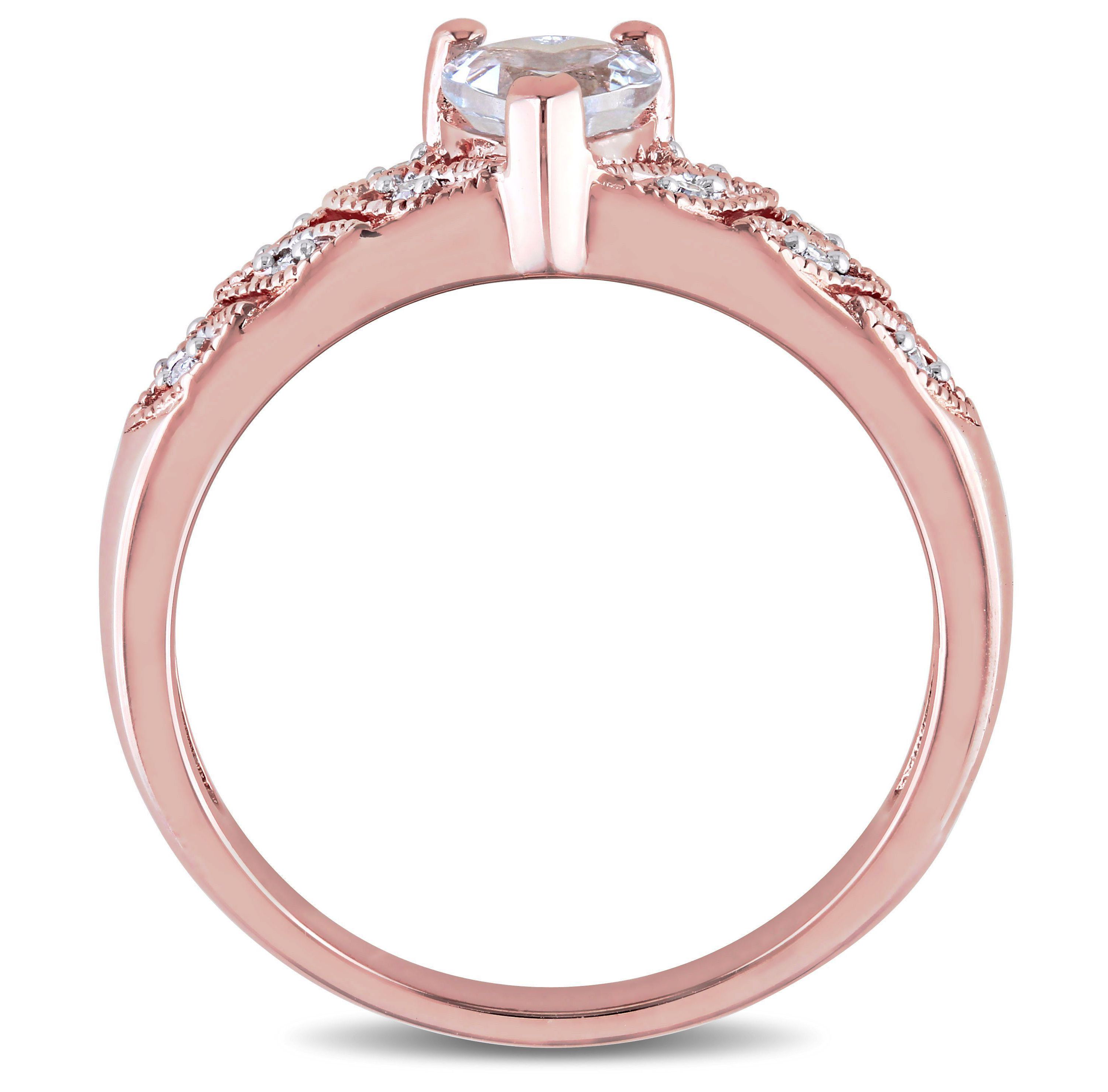 1/3 ct. t.g.w. Aquamarine and 1/10 ct. t.w. Diamond Heart Ring in Rose Plated Sterling Silver