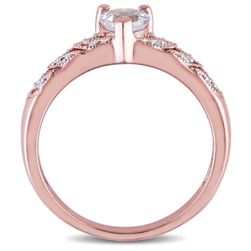 1/3 ct. t.g.w. Aquamarine and 1/10 ct. t.w. Diamond Heart Ring in Rose Plated Sterling Silver
