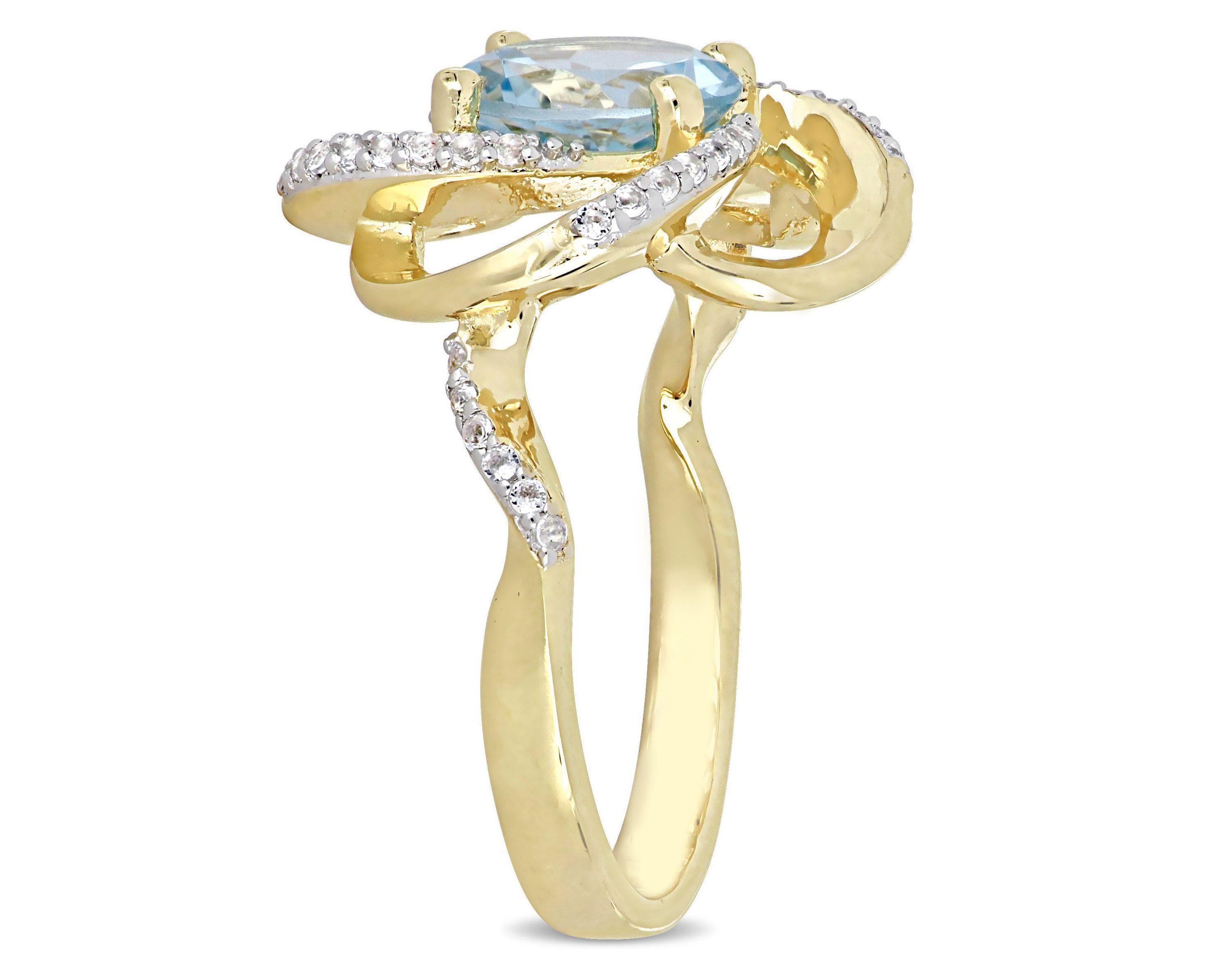 2.57 ct. t.g.w. Sky Blue Topaz and White Topaz Swirl Ring in Yellow Plated Sterling Silver