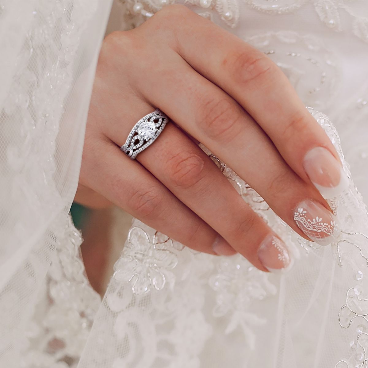 Lab Created Created White Sapphire and 1/4 ct. t.w. Diamond Infinity Bridal Ring Set in 10K White Gold