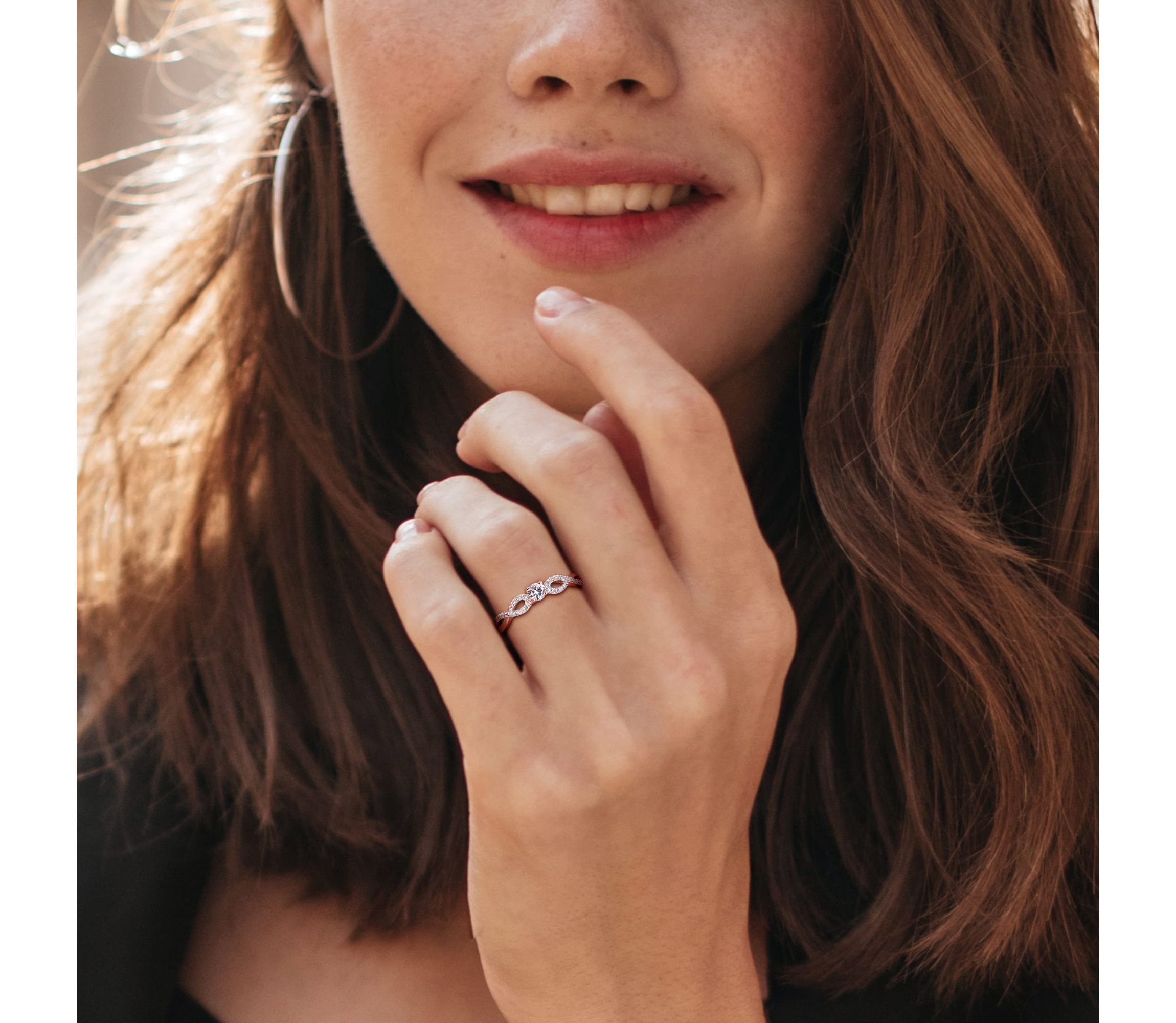 Lab Created Created White Sapphire and 1/10 ct. t.w. Diamond Infinity Ring in Rose Plated Sterling Silver