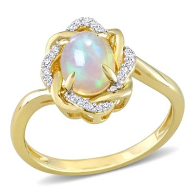 Belk & Co Blue Ethiopian Opal and 1/10 ct. t.w. Diamond Swirl Ring in 10K Yellow Gold