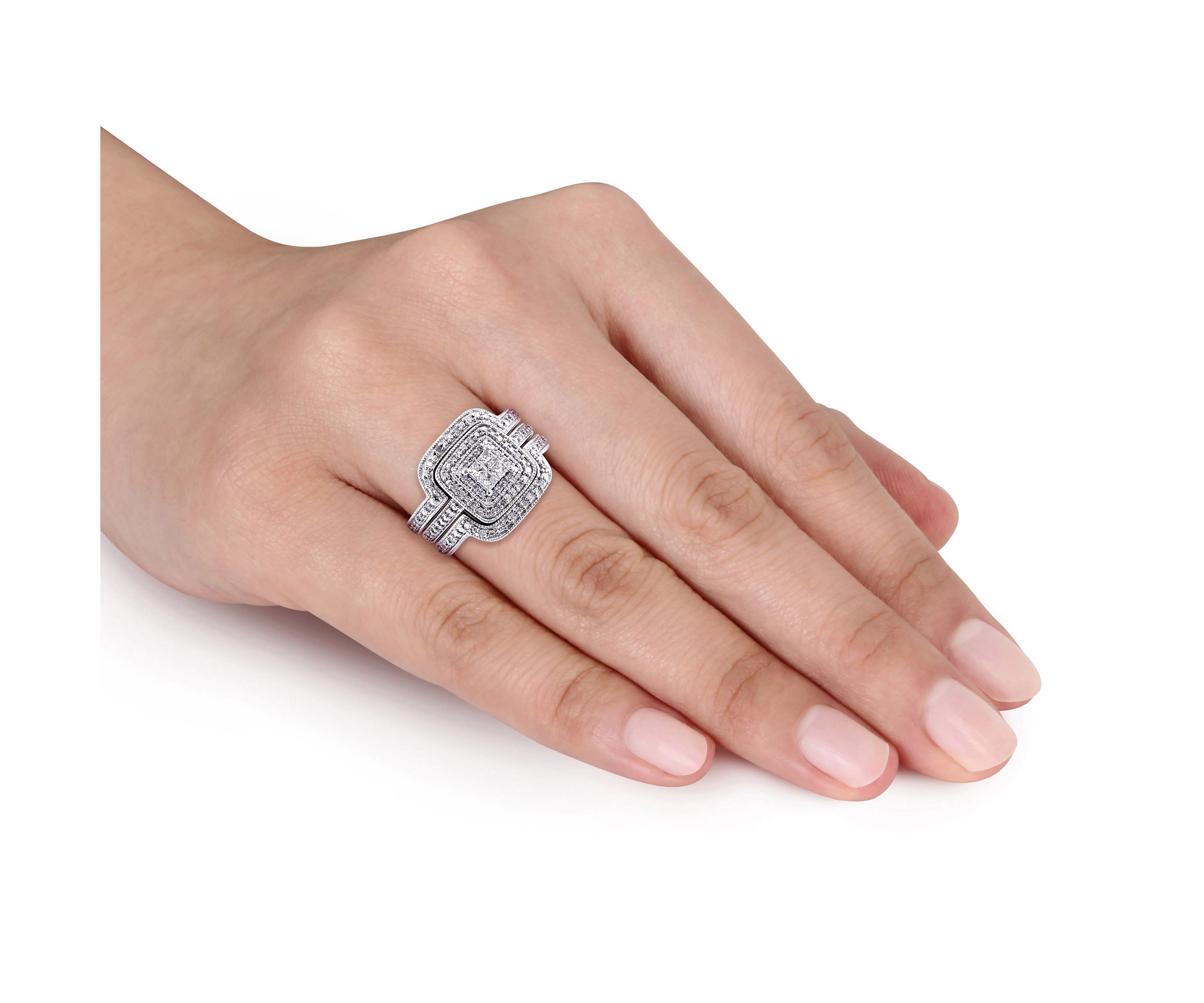 3/8 ct. t.w. Diamond Quad Halo Bridal Ring Set in Sterling Silver