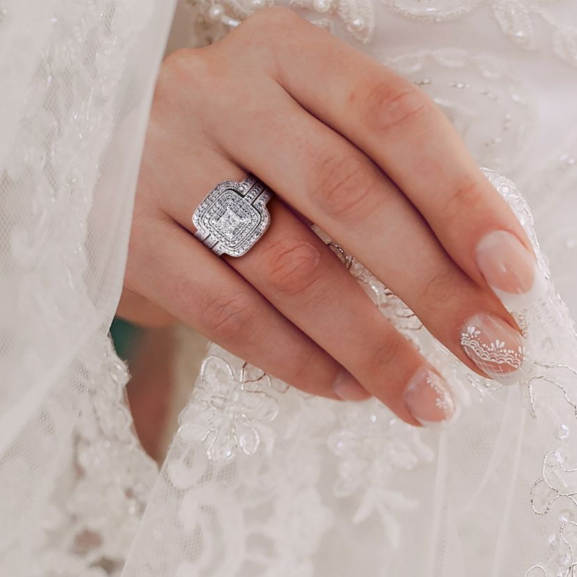 3/8 ct. t.w. Diamond Quad Halo Bridal Ring Set in Sterling Silver