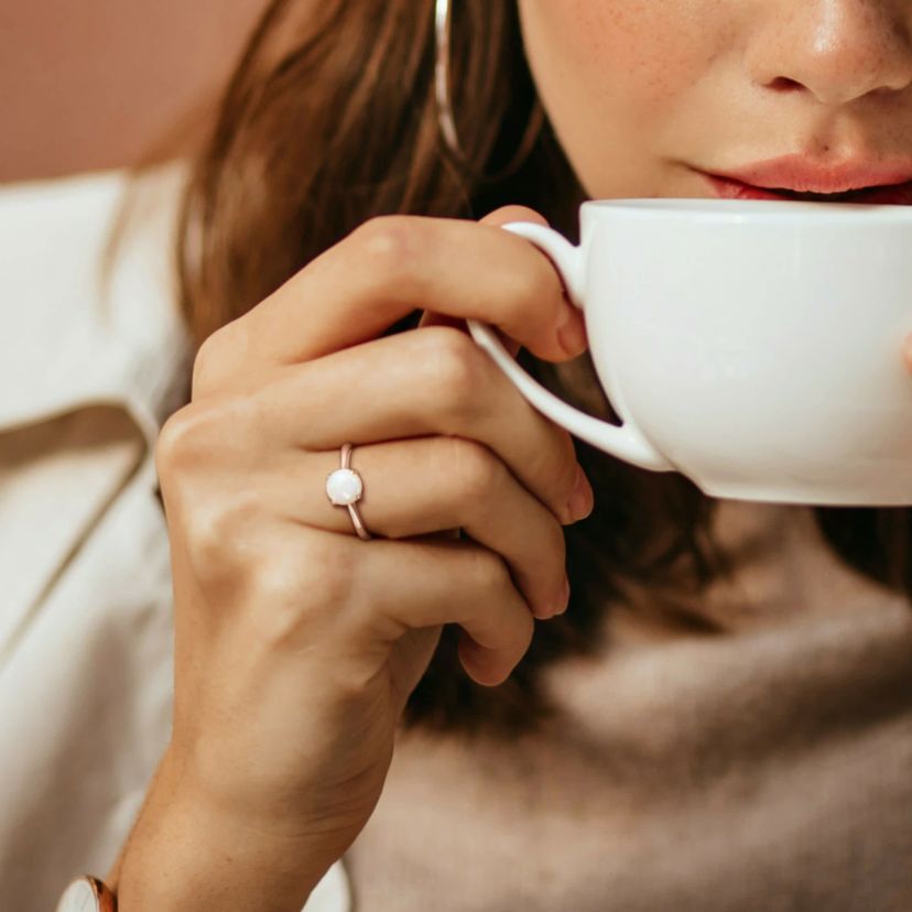 Opal Solitaire Engagement Ring in Sterling Silver