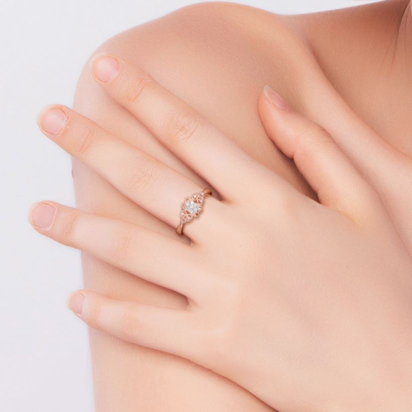 1/10 ct. t.w. Diamond Engagement Ring in Rose Plated Sterling Silver
