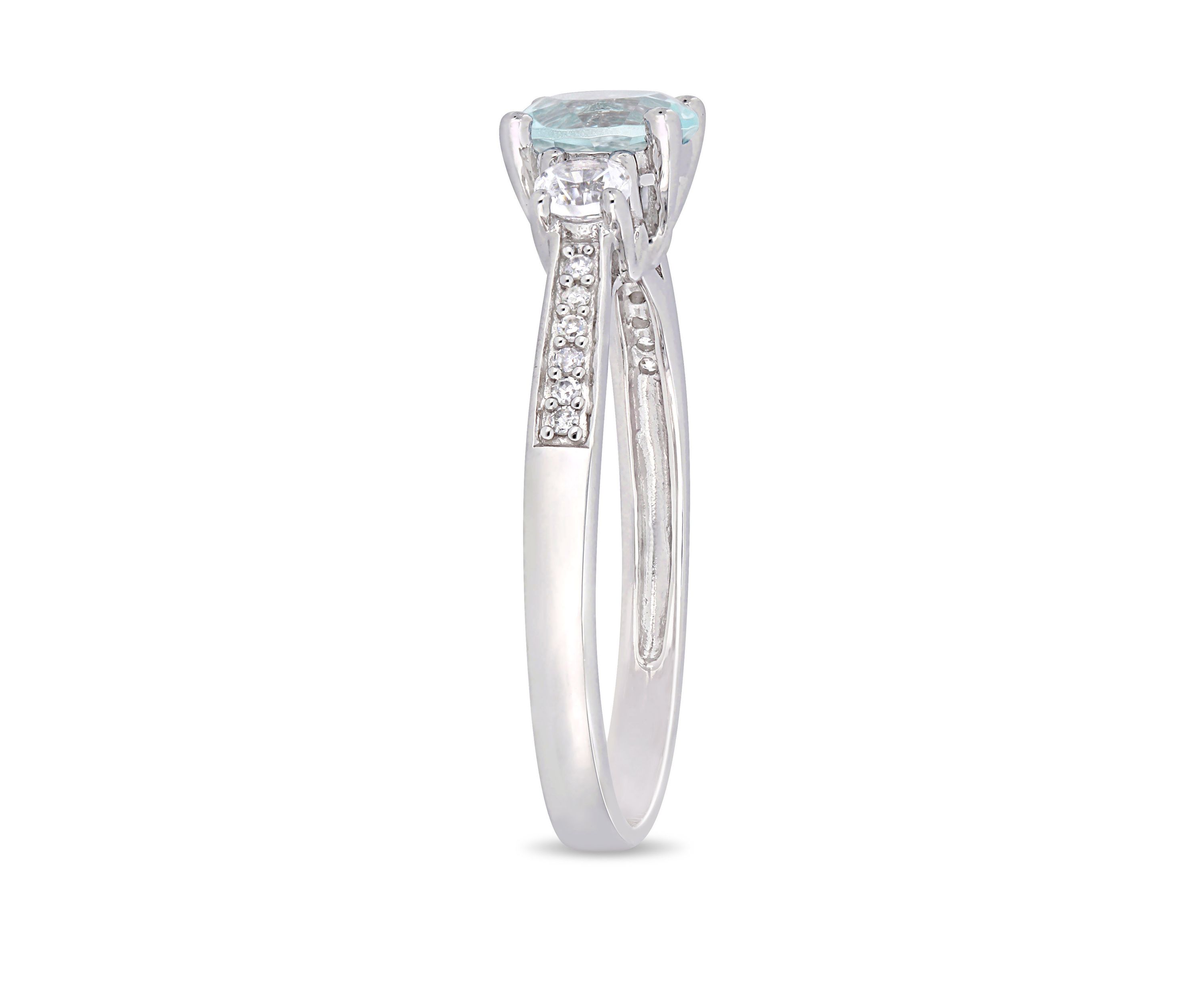 3/4 ct. t.w. Aquamarine, 1/3 ct. t.w. Created White Sapphire, and 0.05 ct. t.w. Diamond 3 Stone Ring in 10K White Gold