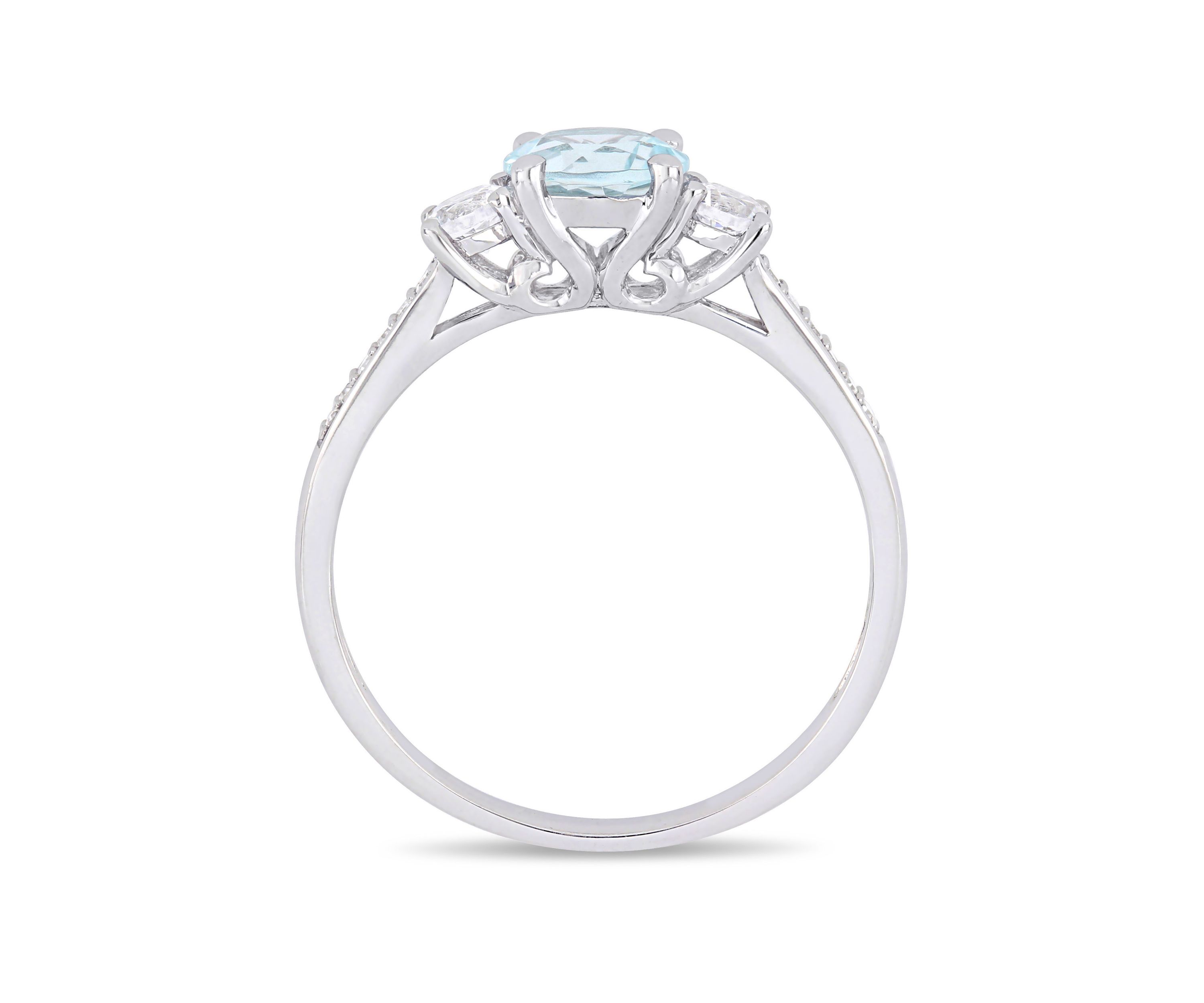 3/4 ct. t.w. Aquamarine, 1/3 ct. t.w. Created White Sapphire, and 0.05 ct. t.w. Diamond 3 Stone Ring in 10K White Gold