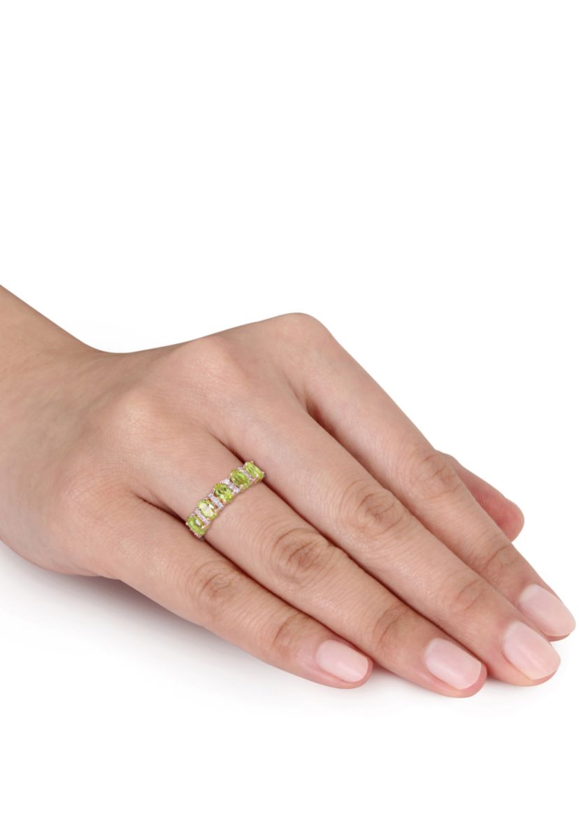1.2 ct. t.w. Peridot and 1/6 ct. t.w. Diamond Semi Eternity Ring in 14k Yellow Gold
