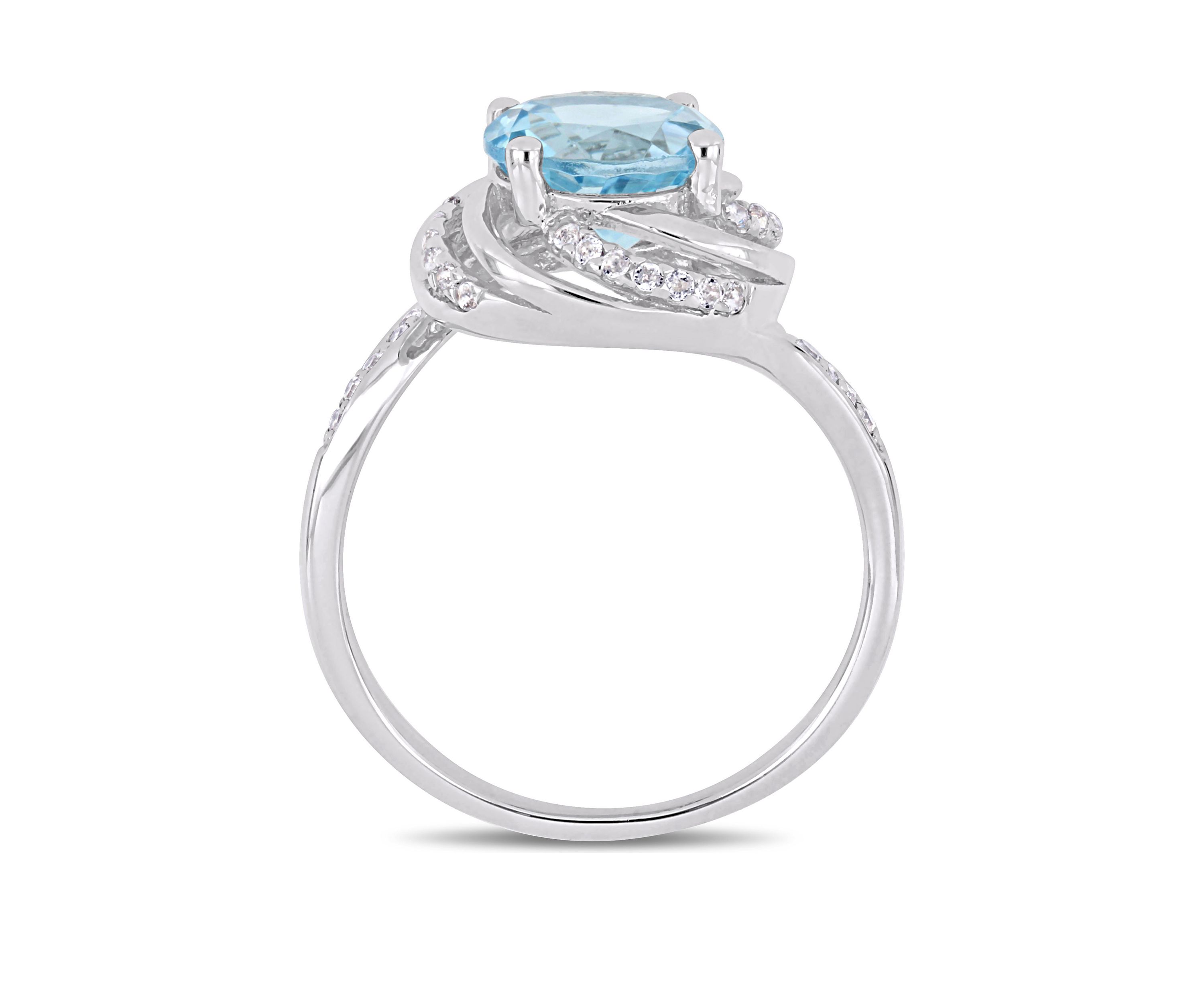  2.5 ct. t.w. Blue and White Topaz and 1/10 ct. t.w. Diamond Accent Swirl Ring in Sterling Silver