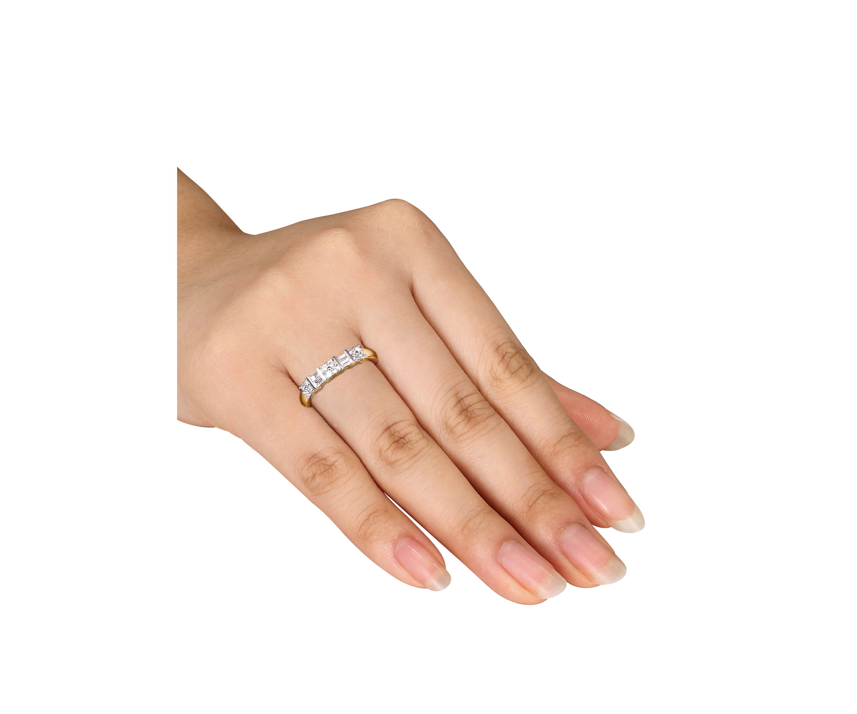  1/4 ct. t.w. Baguette and Round Diamond Anniversary Band in 10k Yellow Gold