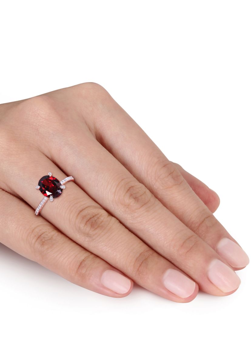 2.88 ct. t.w. Garnet and 1/10 ct. t.w. Diamond Oval Ring in 10k Rose Gold