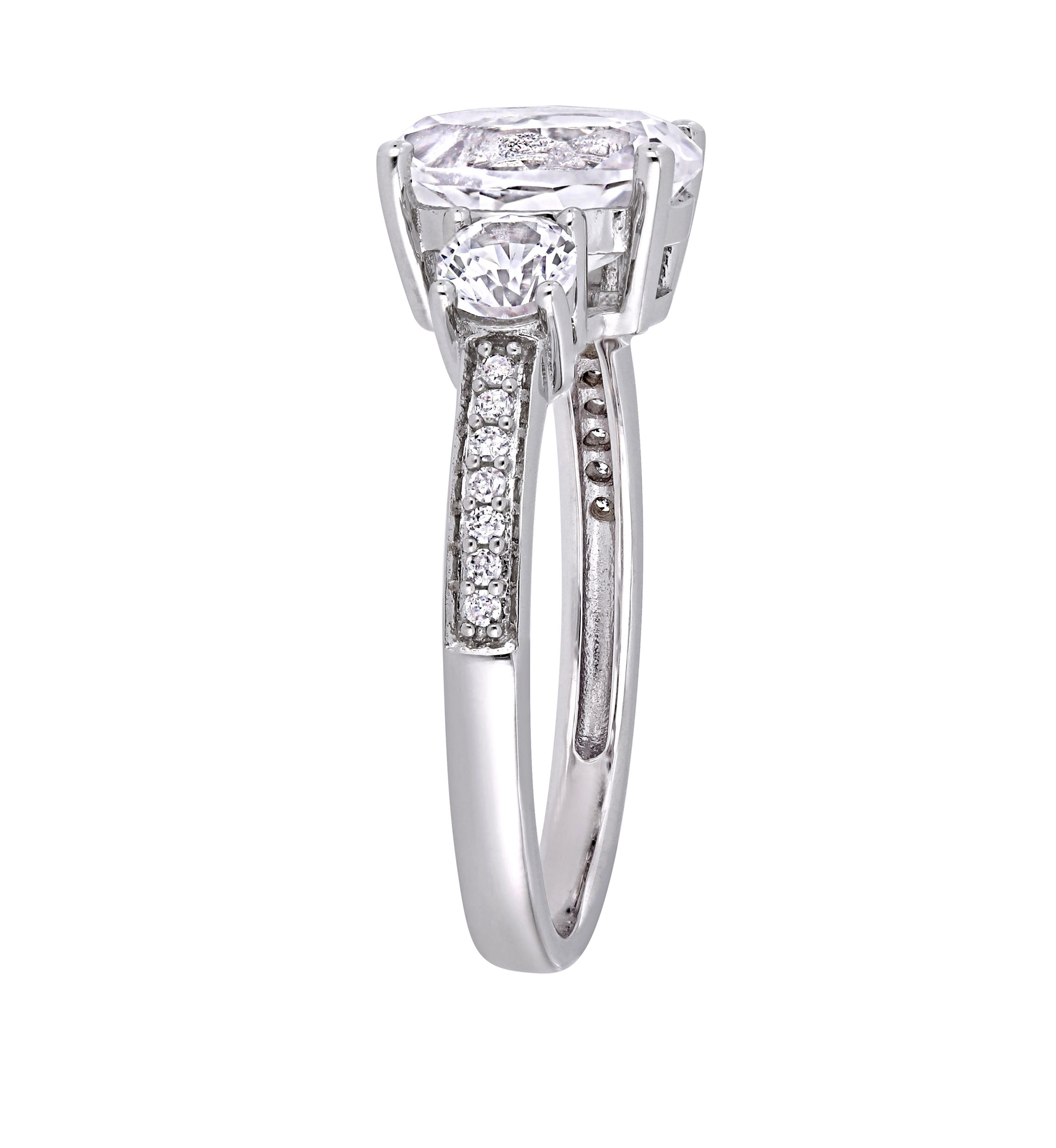 3.3 ct. t.w. Lab Created White Sapphire and 1/10 ct. t.w. Diamond Oval 3 Stone Ring in 10K White Gold