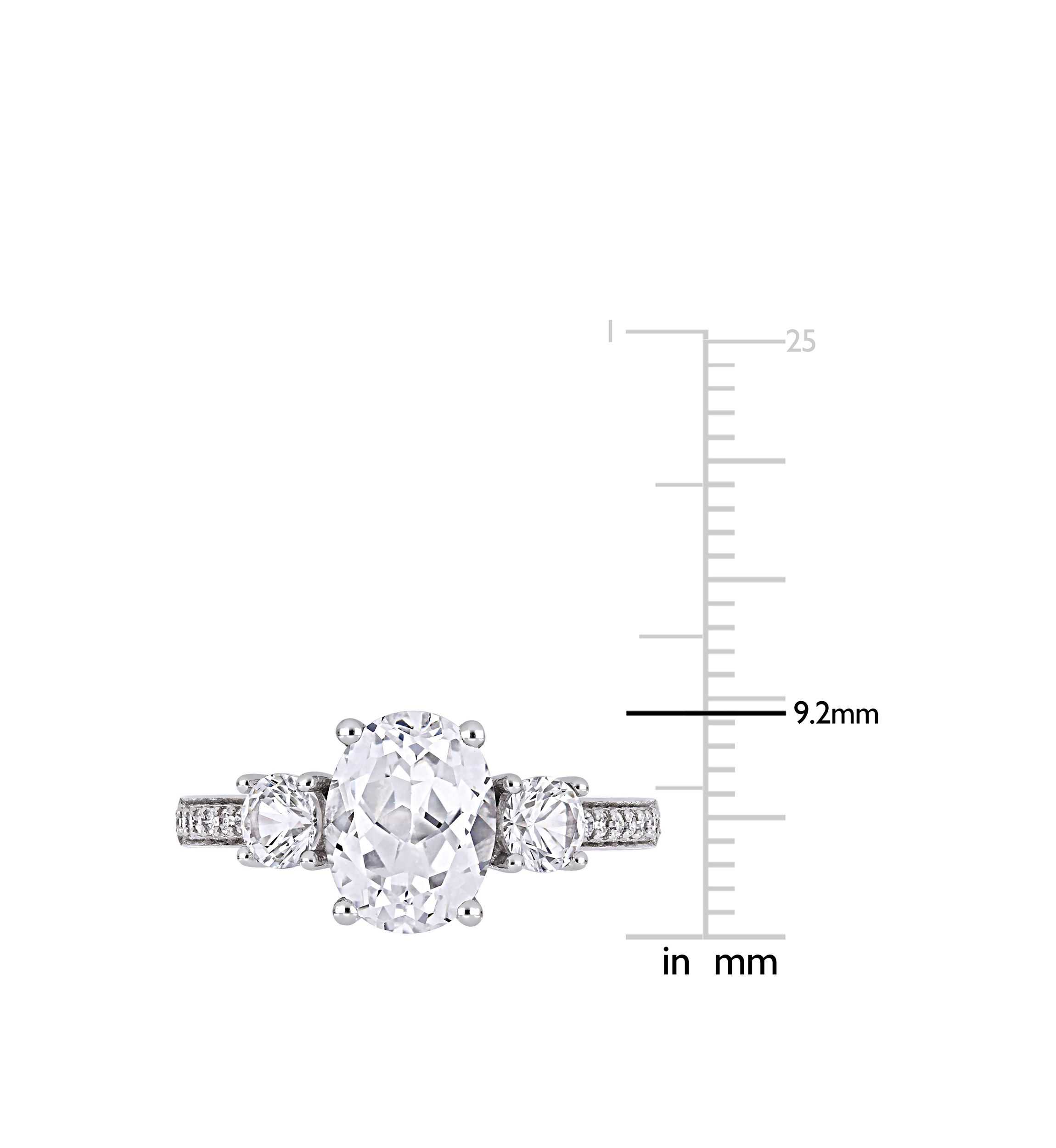 3.3 ct. t.w. Lab Created White Sapphire and 1/10 ct. t.w. Diamond Oval 3 Stone Ring in 10K White Gold