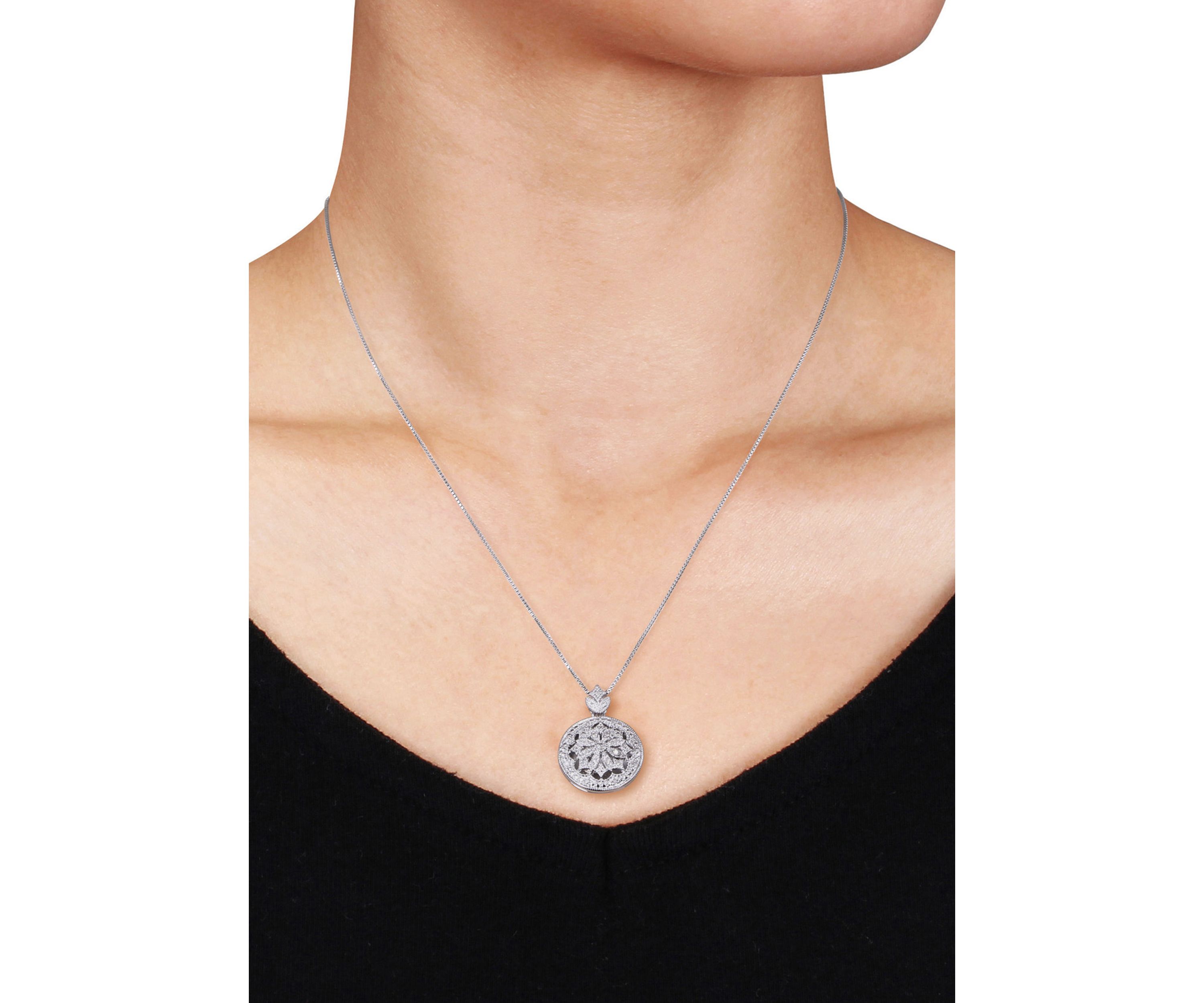 1/10 ct. t.w. Diamond Locket Pendant in Sterling Silver