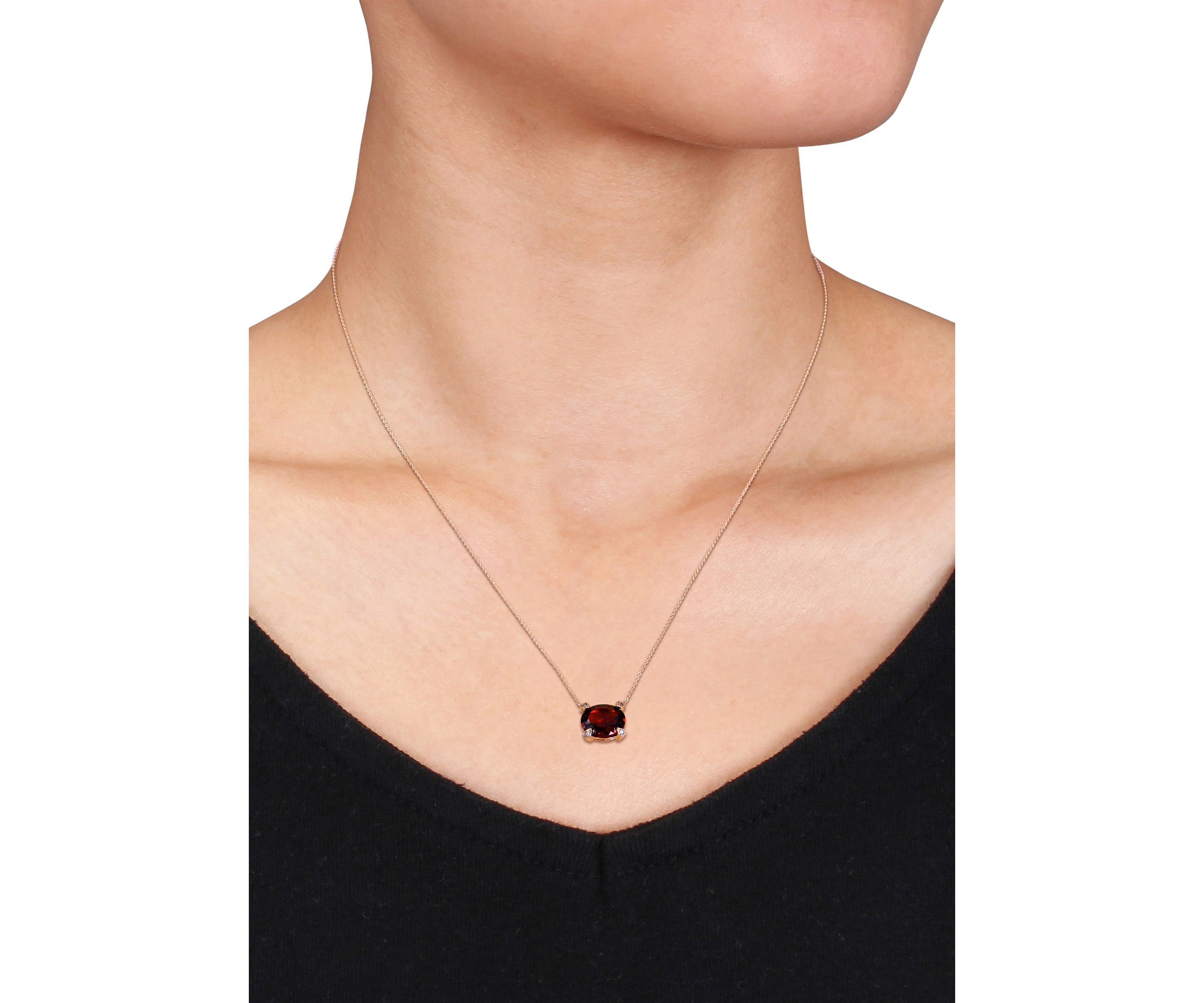 2.88 ct. t.w. Garnet and 1/10 ct. t.w. Diamond Accent Oval Station Necklace in 10k Rose Gold