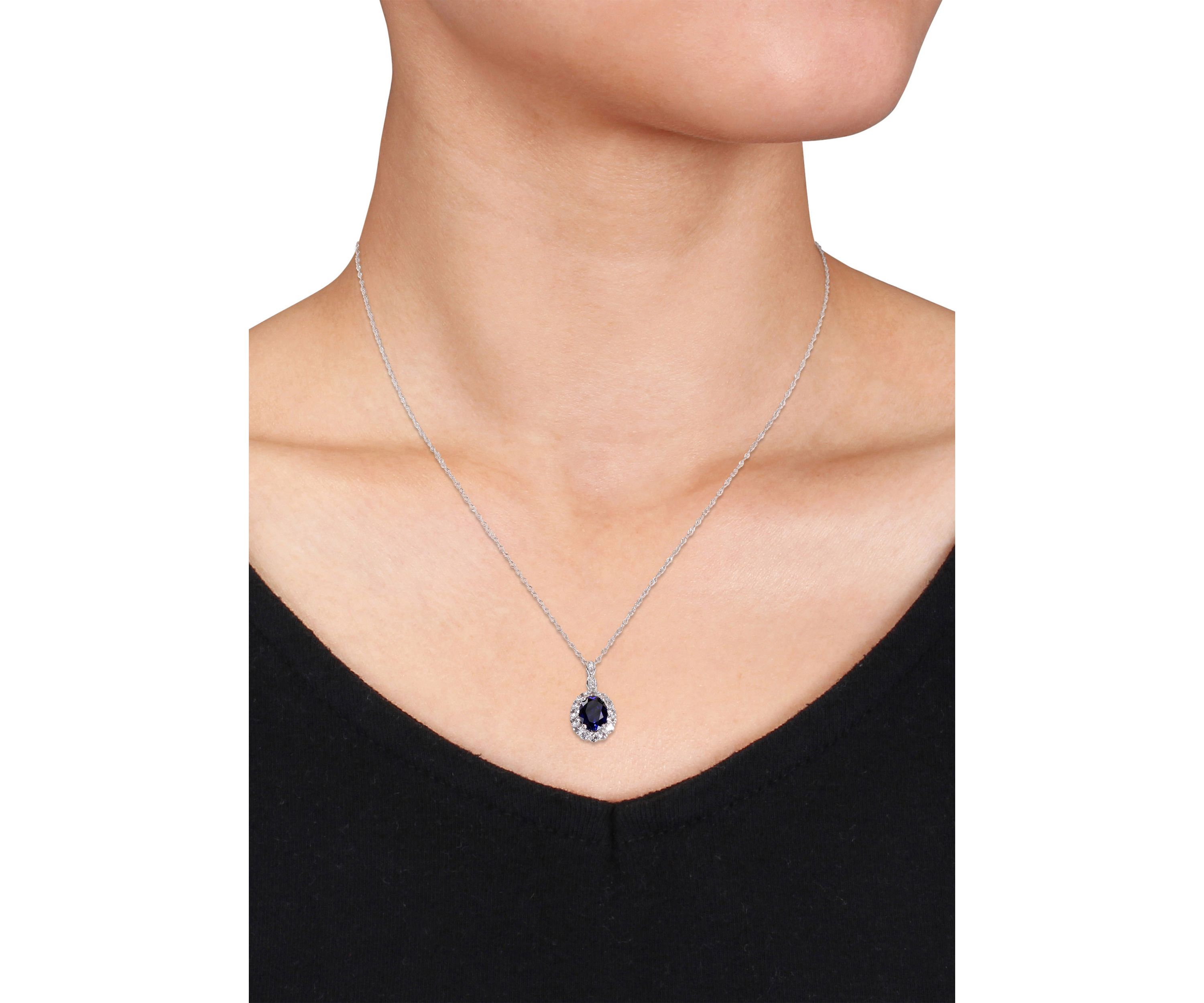 Created Blue Sapphire, White Topaz and Diamond Accent Oval Vintage Pendant With Chain in 14k White Gold