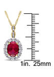 Oval Created Ruby, White Topaz and Diamond Accent Vintage Pendant with Chain in 14k Yellow Gold