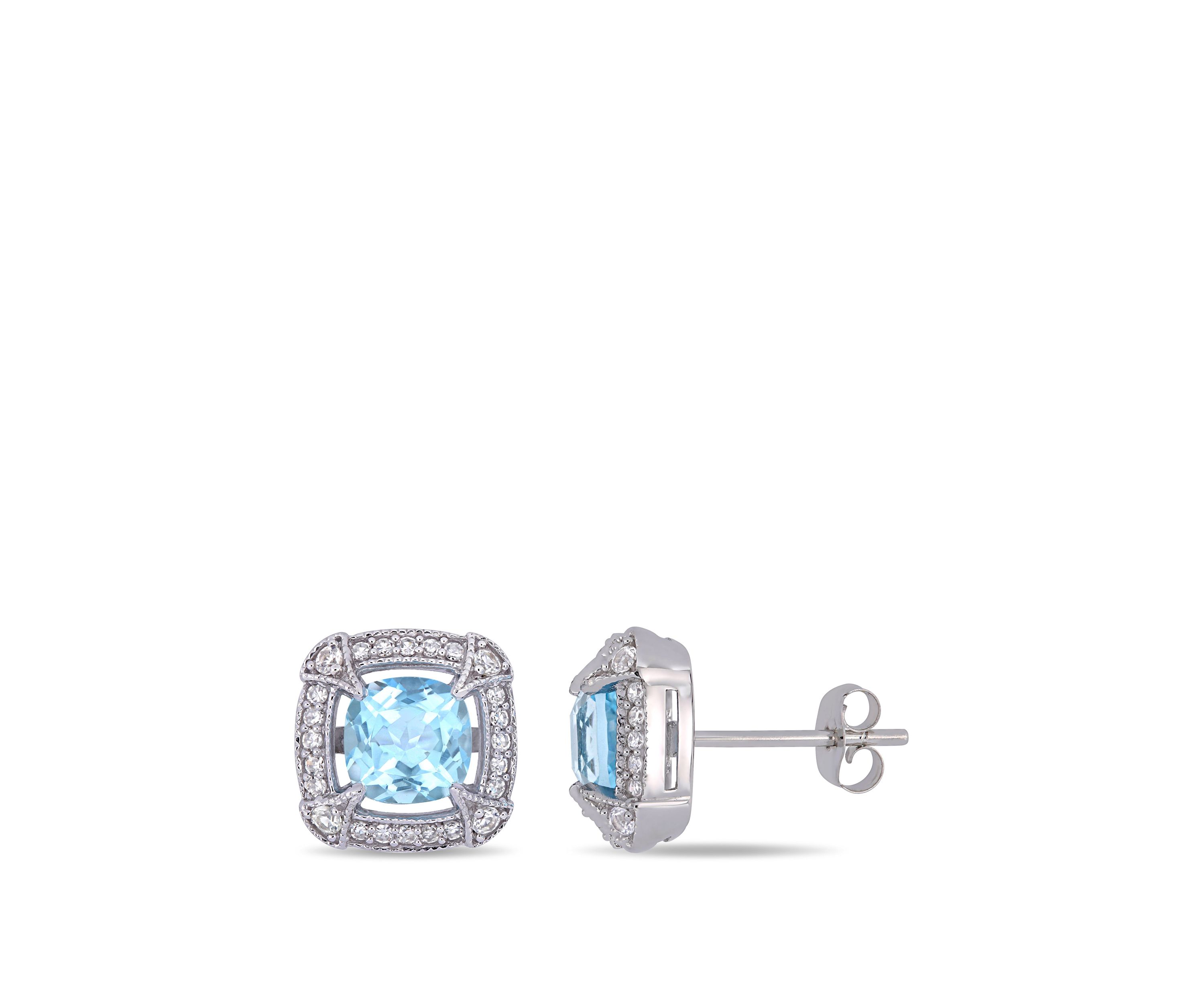  2.38 ct. t.w. Blue Topaz, 1/8 ct. t.w. White Sapphire and 1/5 ct. t.w. Diamond Halo Stud Earrings in 10k White Gold