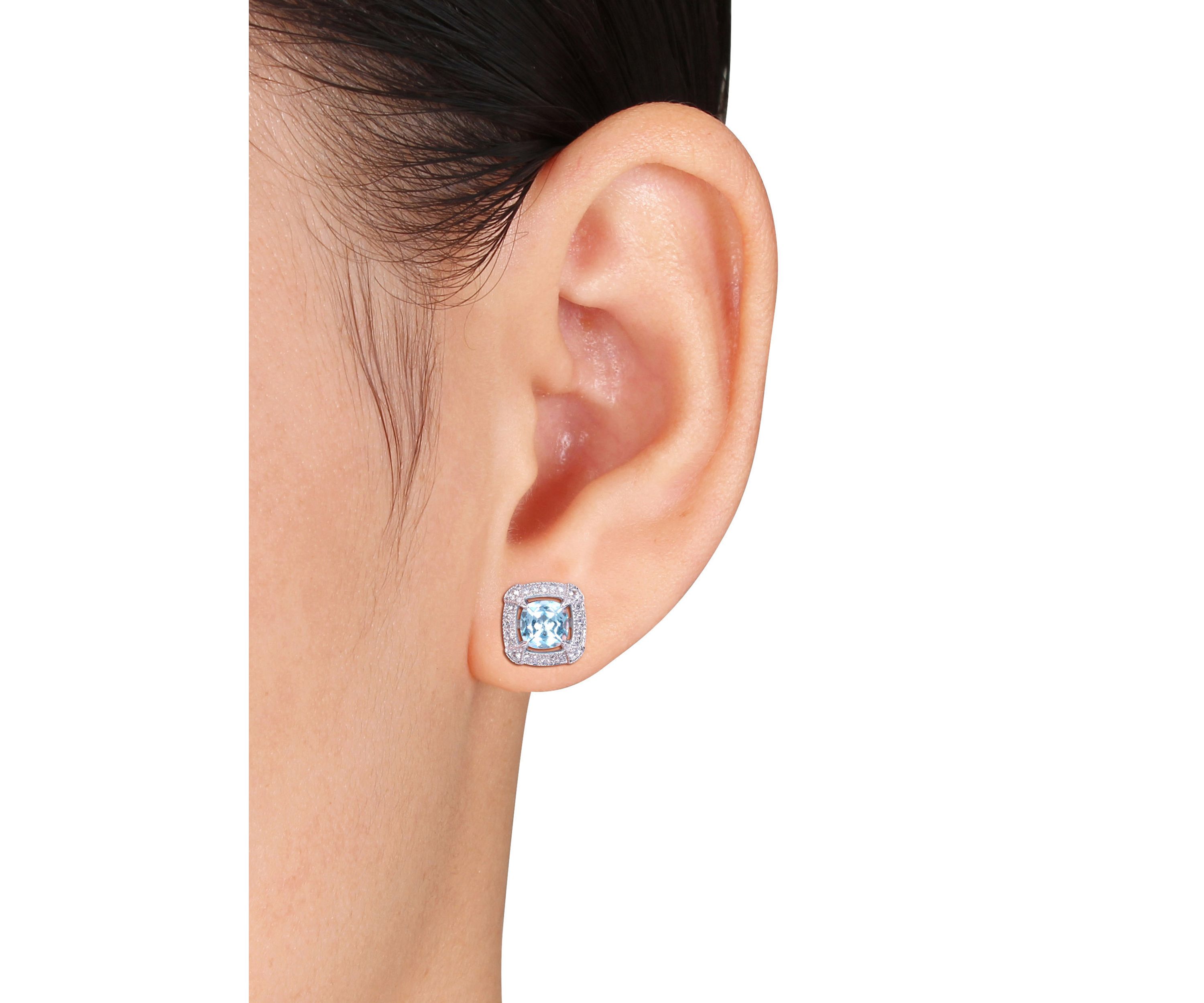  2.38 ct. t.w. Blue Topaz, 1/8 ct. t.w. White Sapphire and 1/5 ct. t.w. Diamond Halo Stud Earrings in 10k White Gold