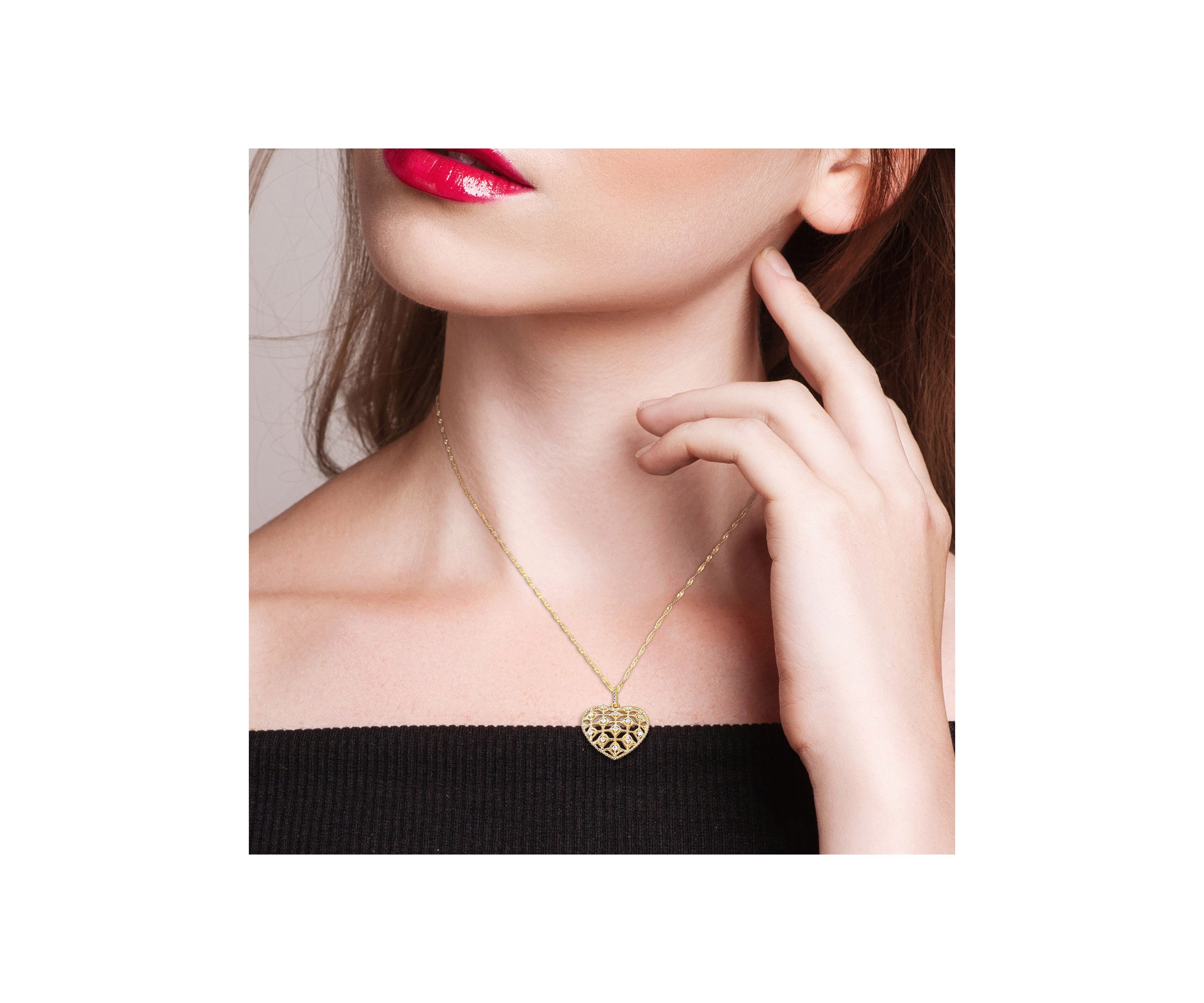 1/5 ct. t.w. Diamond Lace Heart Pendant with Chain in 14K Yellow Gold