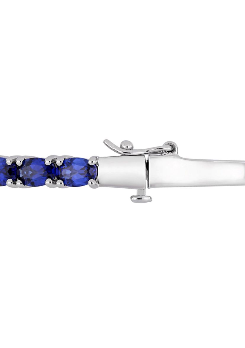 Lab Created 8.25 ct. t.g.w. Oval-Cut Created Blue Sapphire Bangle in Sterling Silver