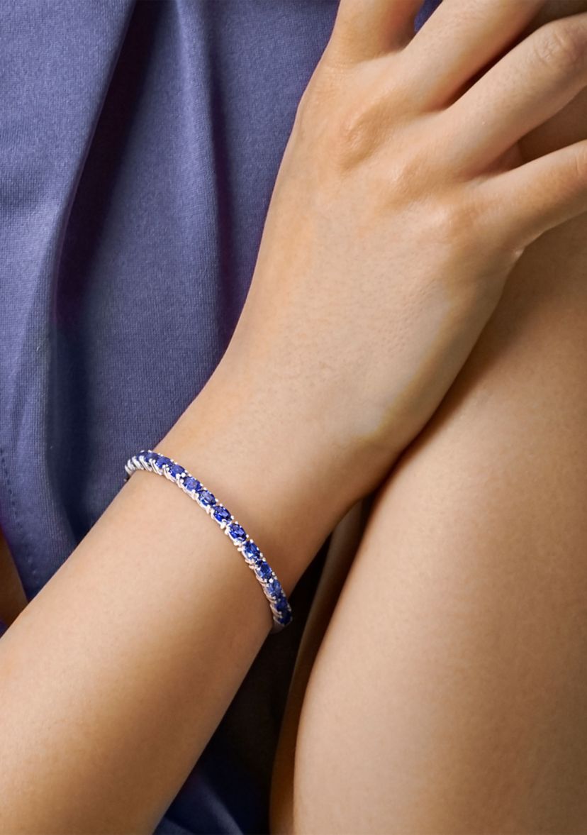 Lab Created 8.25 ct. t.g.w. Oval-Cut Created Blue Sapphire Bangle in Sterling Silver