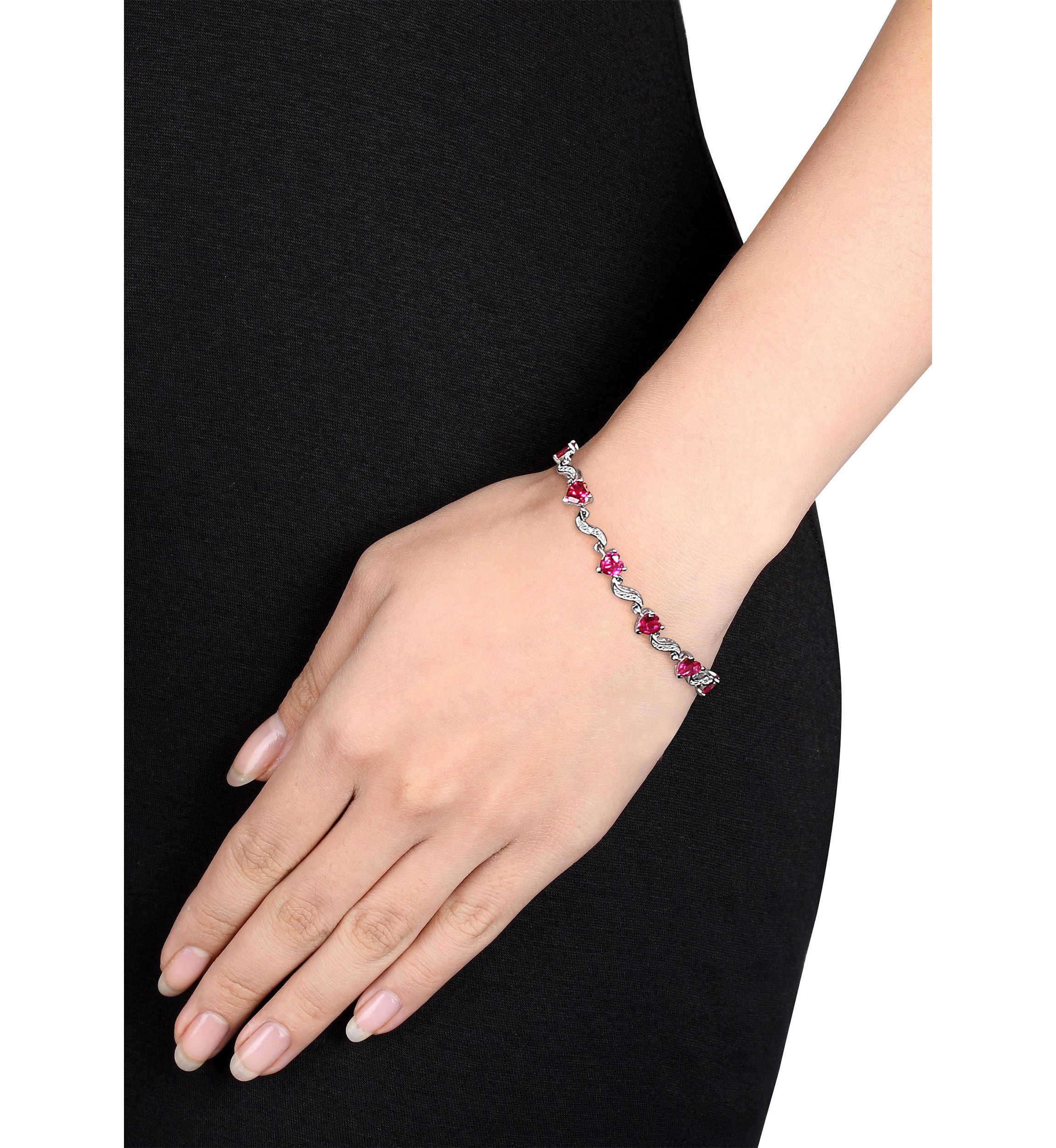 Lab Created 9.09 ct. t.g.w. Heart Shaped Created Ruby and Diamond Accent Bracelet in Sterling Silver