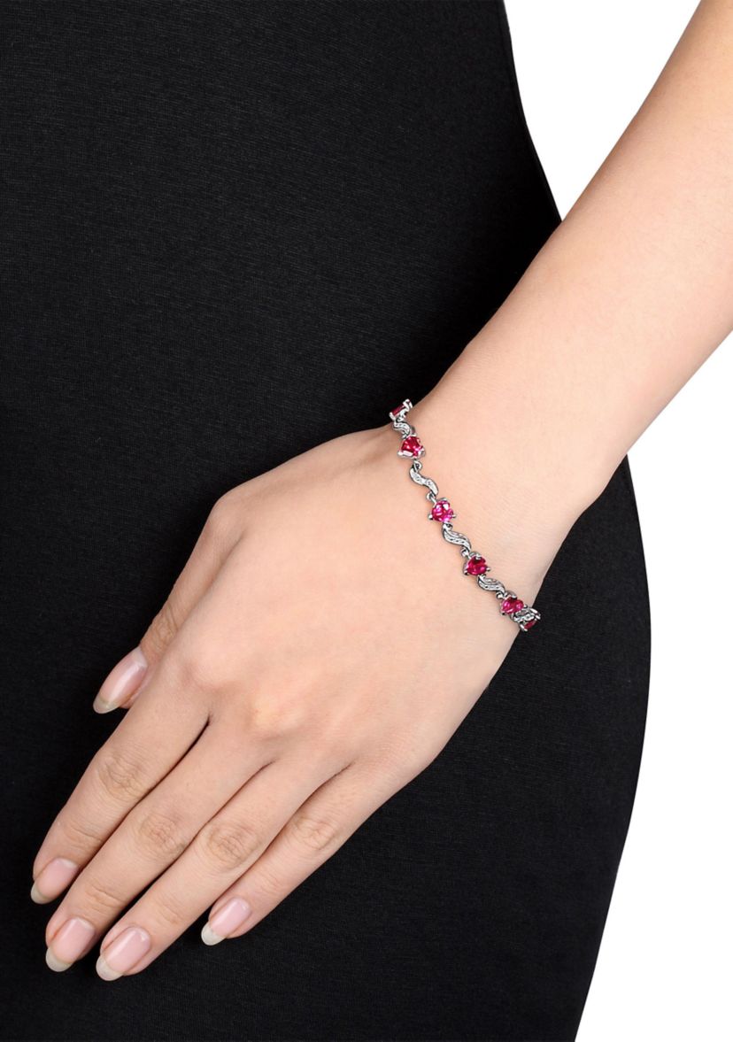 Lab Created 9.09 ct. t.g.w. Heart Shaped Created Ruby and Diamond Accent Bracelet in Sterling Silver