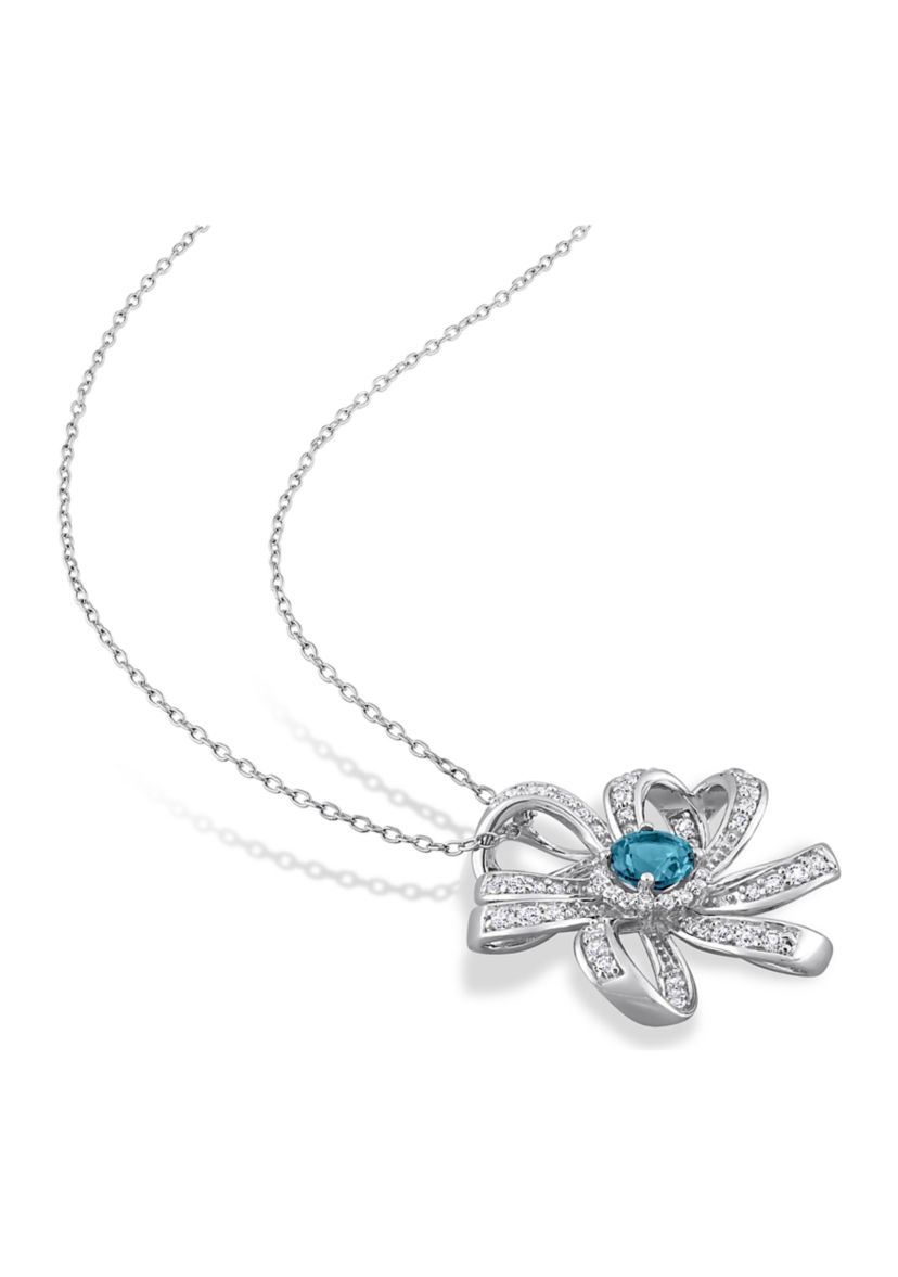 2.26 ct. t.g.w. London Blue Topaz and White Topaz Flower Pendant with Chain in Sterling Silver
