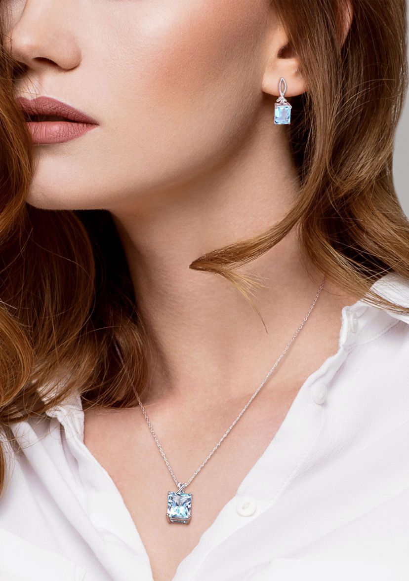15 3/4 CT TGW Sky Blue Topaz and White Topaz Leverback Earrings and Pendant Set in Sterling Silver