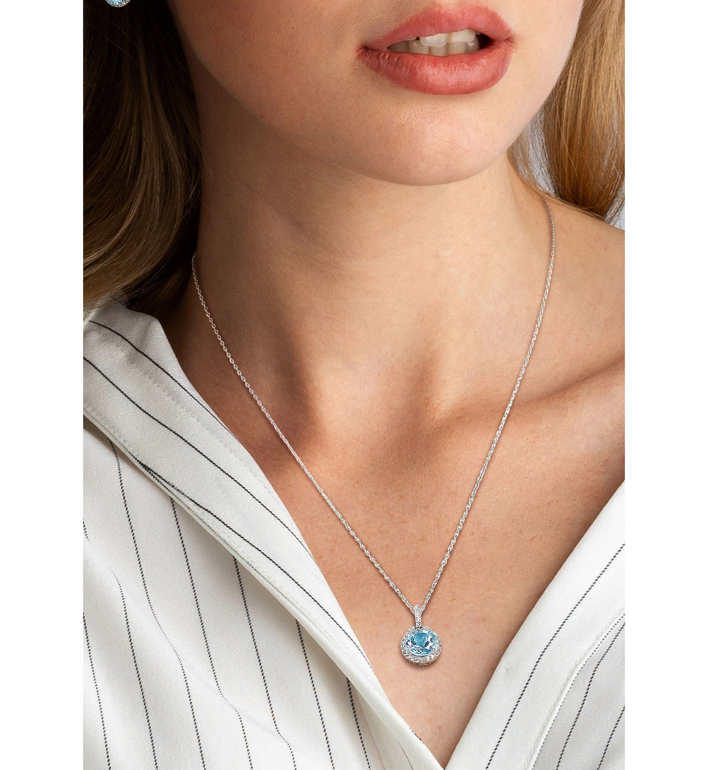 2-Piece Set 9 5/8 CT TGW Blue Topaz and White Topaz Halo Pendant with Chain and Hoop Halo Charm Earrings in Sterling Silver