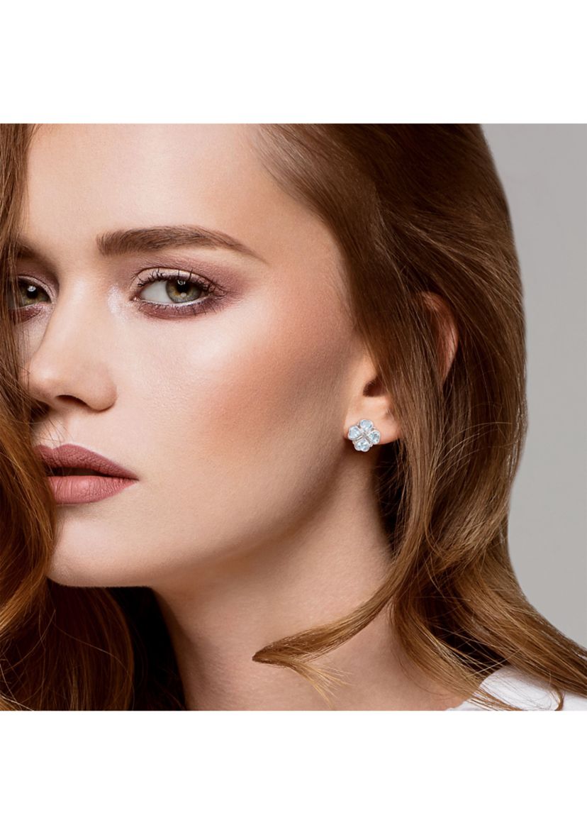 4.43 ct. t.g.w. Sky Blue Topaz Floral Clipback Earrings in Sterling Silver