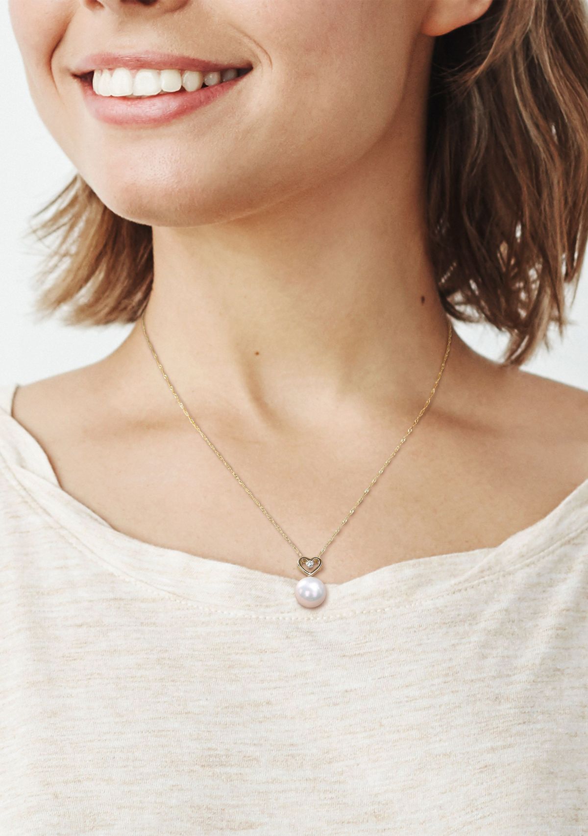 9.5-10mm Freshwater Cultured Pearl and Diamond Accent Heart Drop Pendant with Chain in 10k Yellow Gold