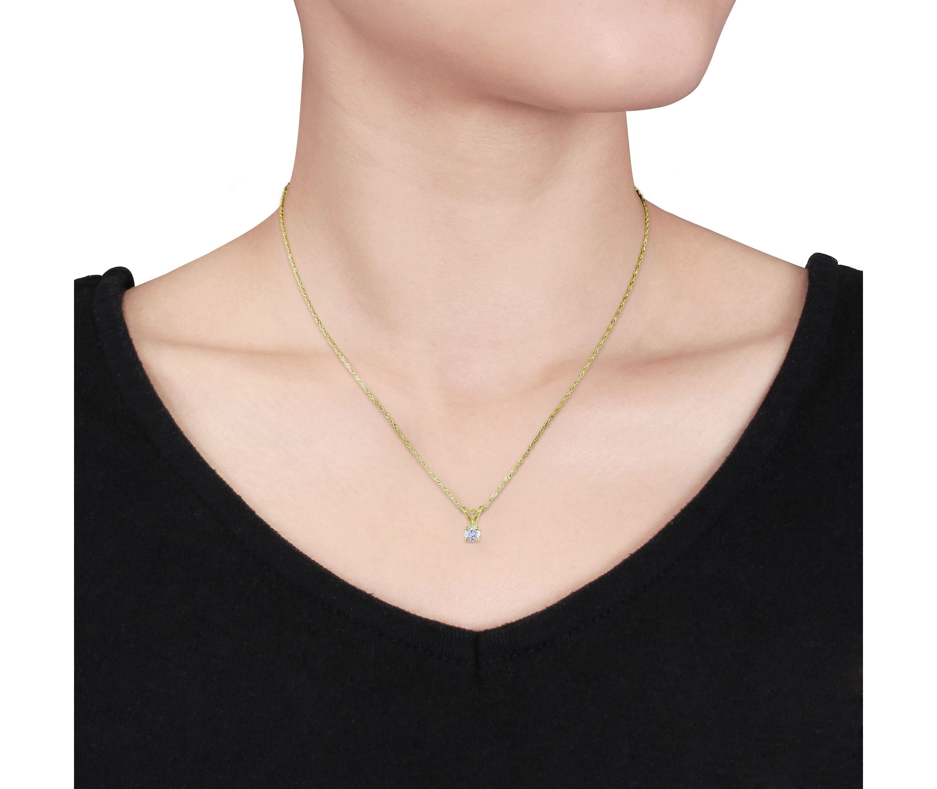 1/10 ct. t.w. Diamond Solitaire Pendant with Chain in 14K Yellow Gold