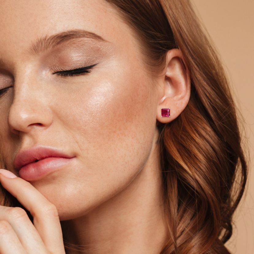 Lab Created 6.12 CT TGW Created Ruby Stud Earrings with Heart Motif in Sterling Silver