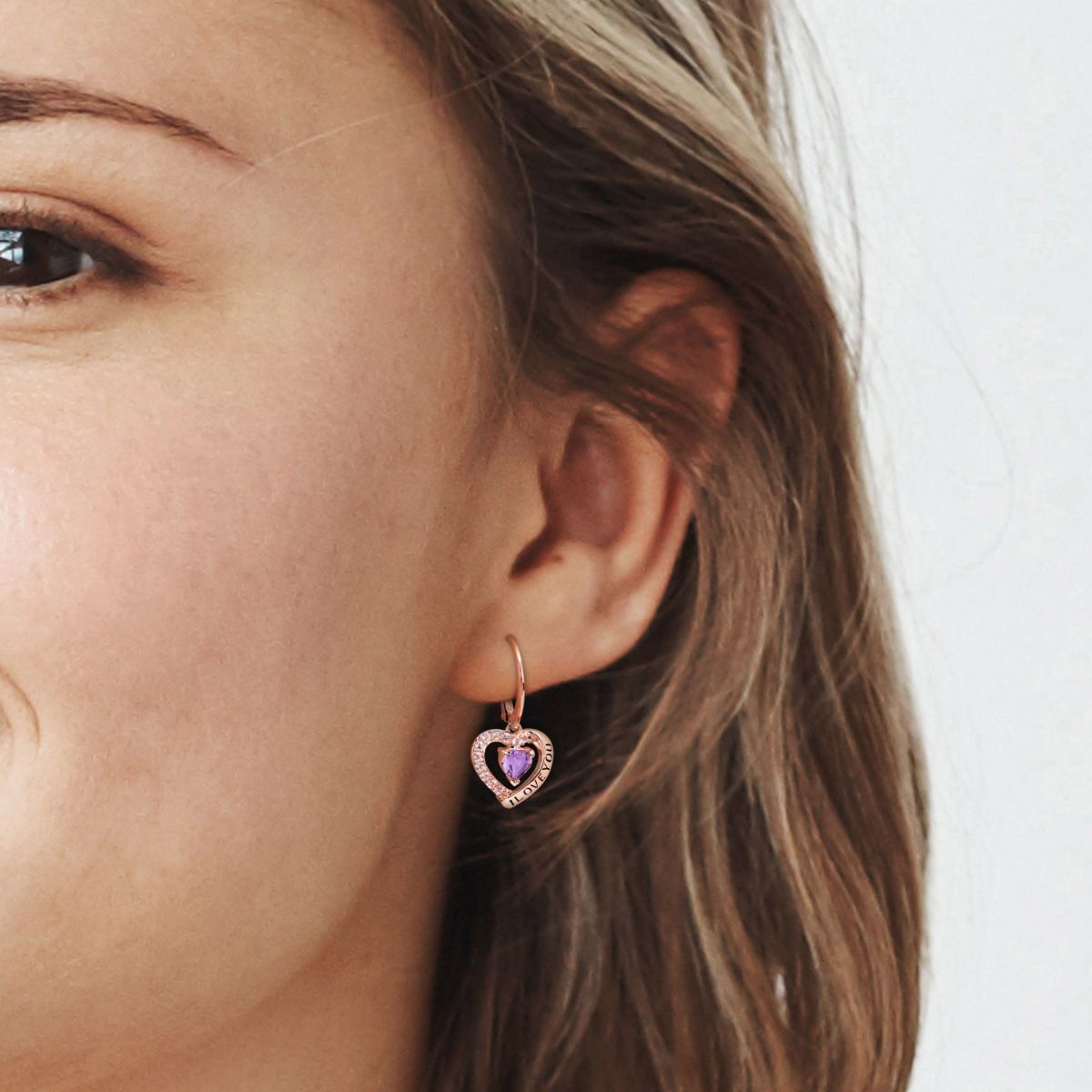 1.46 ct. t.g.w. Amethyst and White Topaz Heart I Love You Earrings in Rose Plated Sterling Silver