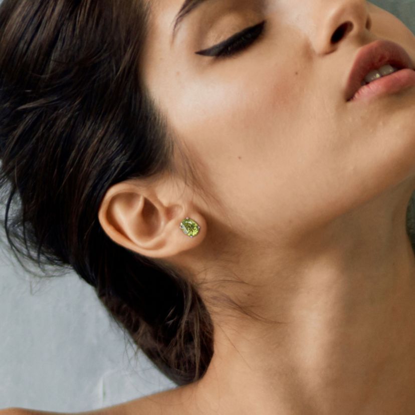3.8 CT TGW Oval Peridot Stud Earrings in Sterling Silver