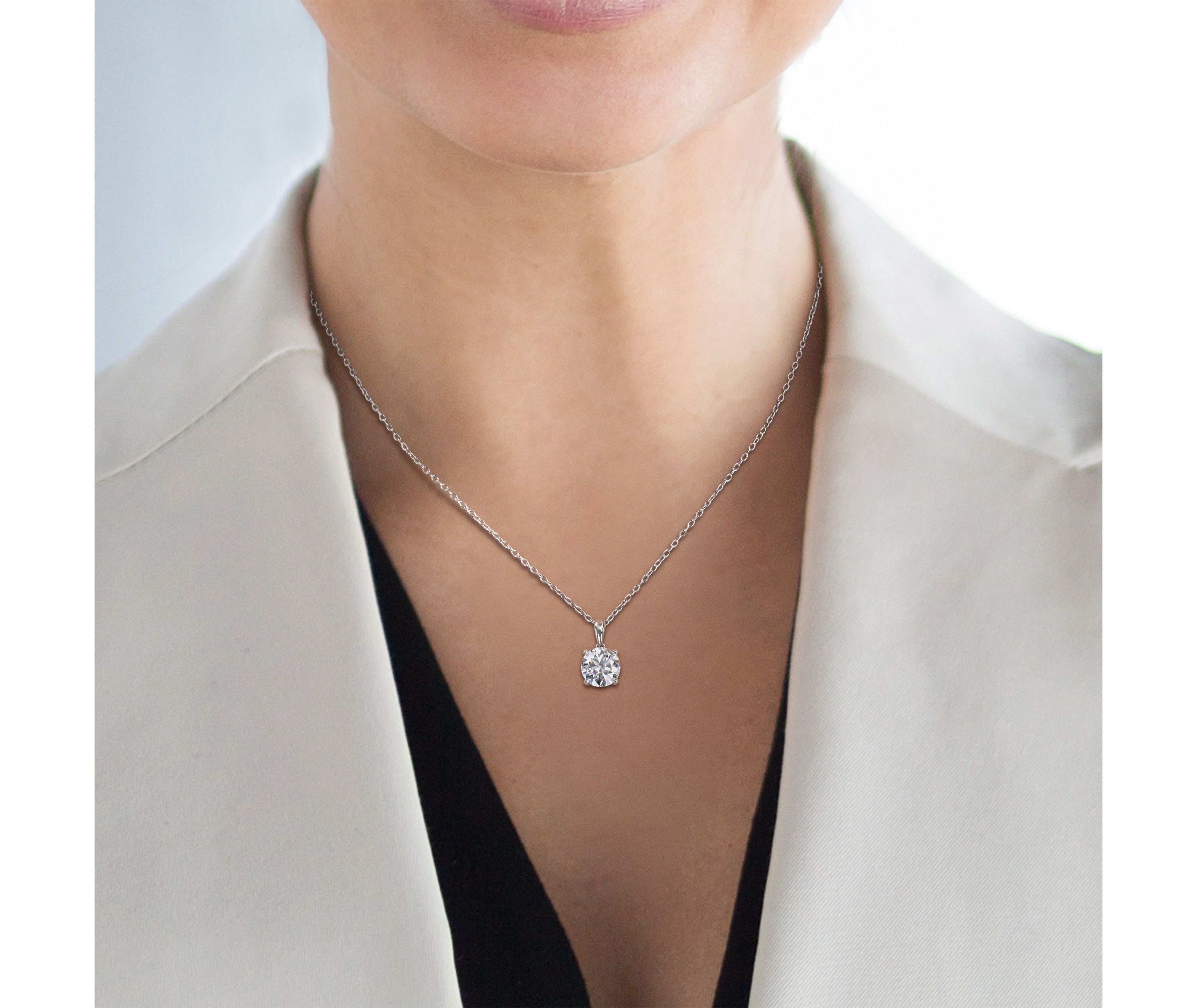 Lab Created 1.84 ct. t.g.w. Created Moissanite Solitaire Pendant with Chain in Sterling Silver