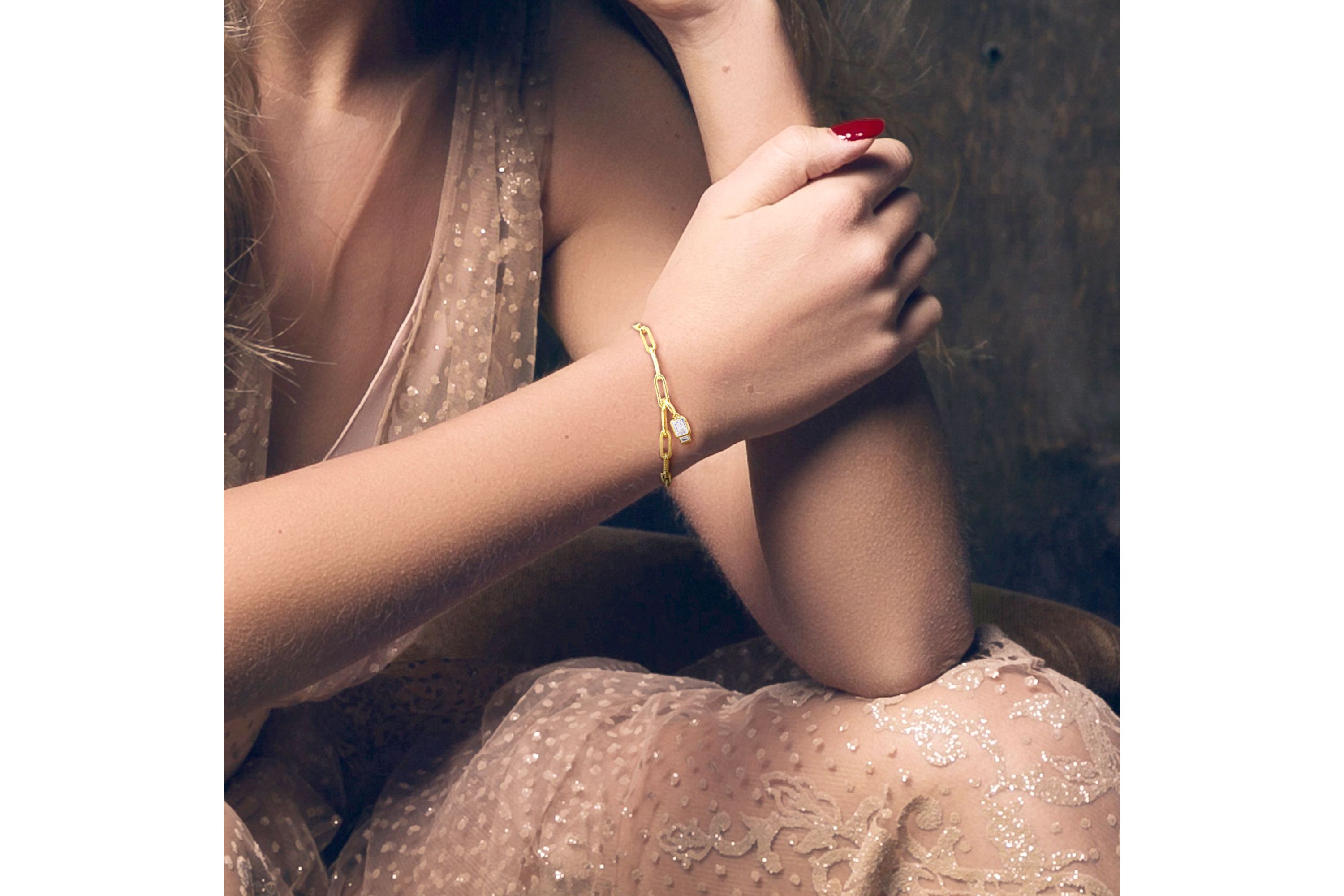 Lab Created Created White Sapphire Oval Link Charm Bracelet in Yellow Plated Sterling Silver