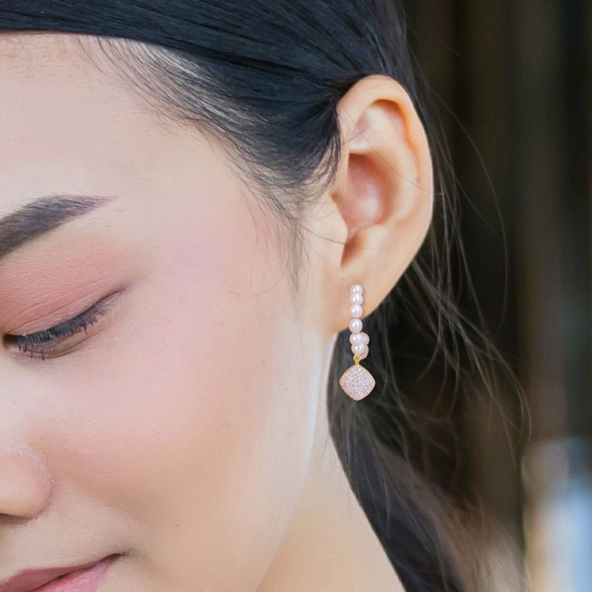 Freshwater Cultured Pearl and 1/10 ct. t.w. Diamond Post Earrings in 10K Yellow Gold