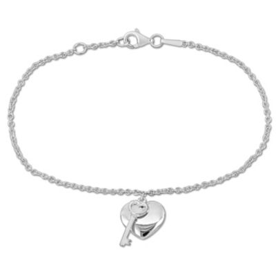 25 ct. t.w. Diamond Heart Lock Charm Toggle Bracelet in 18kt Gold