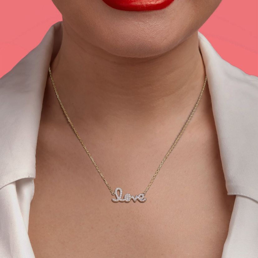 1/4 ct. t.w. Diamond "Love" Necklace in 14K Yellow Gold